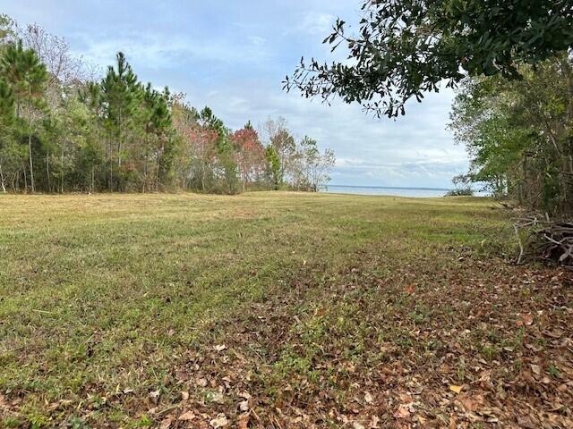 PICTURESQUE!!!!!! 
0.4 acres on Blackwater bay at the end of a private cul-de-sec with approved DEP permits. Waterfront lot in Blackwater Bay Estates. Includes private boat ramp at the community owned lot less than 300' away. Bring your contractor and start building your dream home. Soon you will be waking up to sunrise over Blackwater Bay. Lot comes with approved DEP permits for a 60' x 58' (3400+sq ft) home. Also comes with approved septic tank permit from the Santa Rosa County Health Dept. Zone R1. Buyer is responsible for verifying and researching all information. The HOA is community ran and the $60 yearly dues are used to maintain the waterfront community lot. Lot is cleared and current DEP permit includes seawall. Copy of recent Survey and geotechnical exploration available.