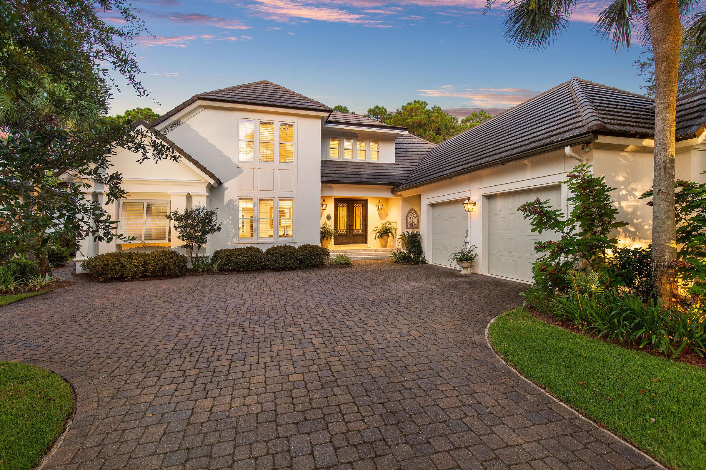 Under contract with a viewing contingency.  Accepting back Contracts.  $370,000 price reduction. This stunning Huff Homes design is in the exclusive community of Burnt Pine, offering wonderful views of the 11th tee box, a golfer's dream. High ceilings & travertine flooring create an airy, elegant ambiance. The chef's kitchen serves as the heart of the home with a two-sided gas fireplace, brick-and-mortar accents, new undermount lighting, stainless appliances, a 6-burner Dacor cooktop, WiFi-enabled oven, granite countertops, & an oversized island with additional sink, wine cooler & ice maker. Pass through French doors to enjoy an oasis-like pool & beautiful lawn with renovated irrigation system. Additional features include recirculating hot water, large closets, exterior elastomeric paint. Enter through the stately metal front doors into a vaulted foyer and formal living area with gas fireplace. Enjoy the company of friends and family in the  open concept kitchen, dining, and family room. Chef's island kitchen is warm and inviting with a gas fireplace and brick and mortar accents. Expansive windows throughout the home flood the space with natural light, creating a bright and inviting atmosphere.

Designed for comfort and luxury, the home boasts four en-suite bedrooms with updated bathrooms, including the primary suite with a spa-like experience. The primary bathroom features Quartz countertops, dual vanities, a walk-in tiled shower with dual shower heads, a towel warmer, a private water closet, and custom his-and-hers closets with built-in dressers and pull-down racks for extra hanging space. Motion-sensor lighting enhances the convenience of large closets throughout the home. Guest baths are updated with custom tile and beautiful accents.

The home is equipped with an alarm system for added security and an instant hot water recirculation system. Bose speakers throughout the living spaces, kitchen, and back porch create an immersive audio experience. A luxurious 8,000-gallon pool provides a private oasis for relaxation and entertainment. Outdoor shower and mini outdoor kitchen installed for added convenience. The brick paver driveway leads to an oversized 2 car garage plus an additional golf cart garage with a dedicated workshop space and a storage closet.

Nestled within the 2,400-acre Sandestin Beach Resort, residents enjoy world-class amenities, including 73 holes of championship golf, tennis and pickleball courts, fishing, a 98-slip marina, scenic nature and biking trails, a full-service health club and spa, golf-cart-friendly pathways, as well as an array of restaurants, entertainment venues, playgrounds, and more.