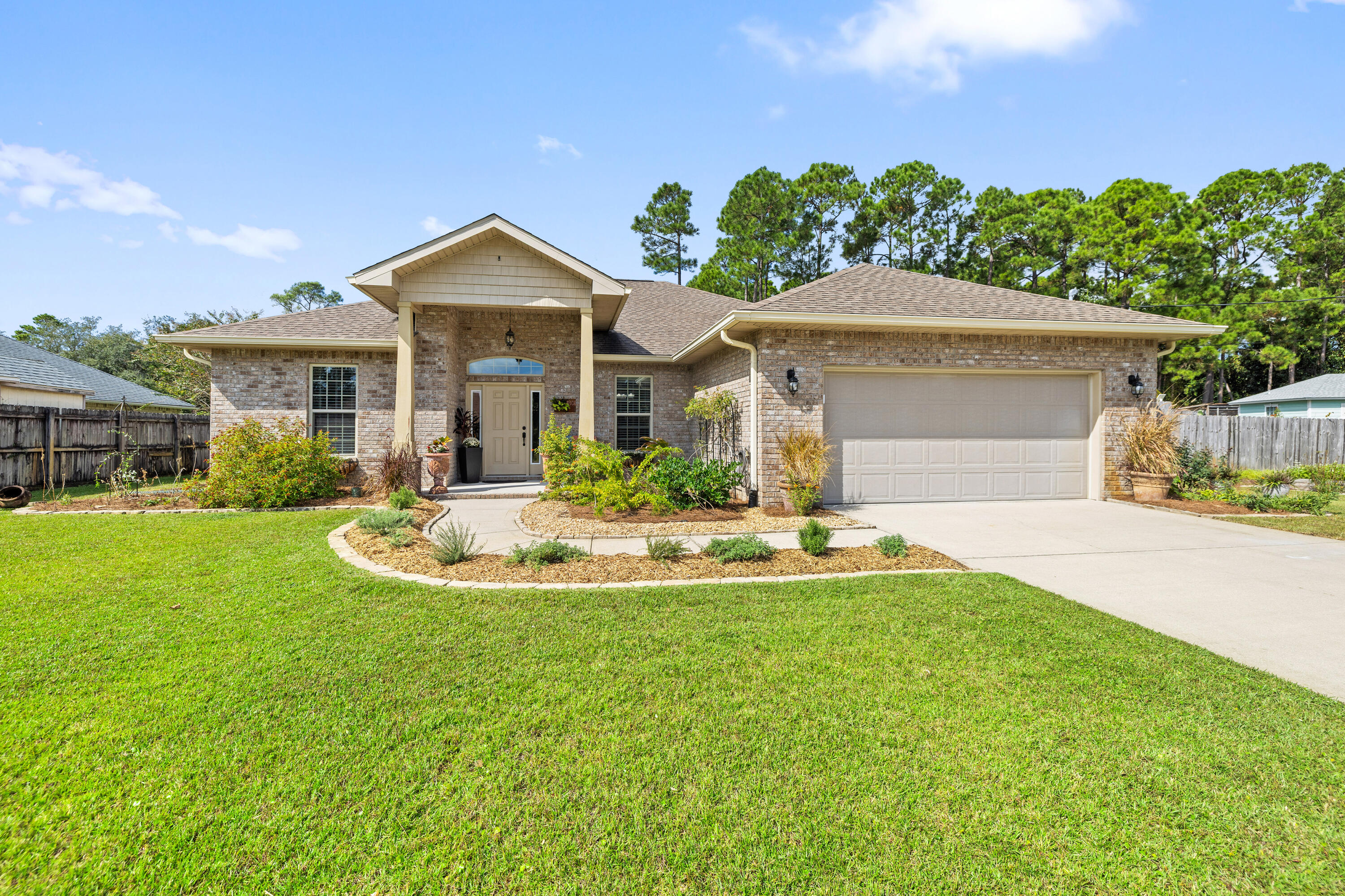Immaculate 4-Bedroom Home on a Spacious Lot with Garden Oasis!

This beautifully maintained 9-year-old, one-owner home looks and feels practically brand new! Featuring 4 bedrooms, 2 bathrooms, and a thoughtful split floorplan, this residence offers comfort, functionality, and style throughout. Inside, you'll find tile flooring in all wet areas, soaring 9-12' ceilings, and bright, open living spaces designed for modern living.

Step outside to your private backyard retreat! Enjoy the stunning outdoor living area with a large pavered patio and a louvered pergola—perfect for relaxing and entertaining while taking in the crisp fall air. The spacious lot is a gardener's dream, boasting mature foliage borders, raised and irrigated garden beds, fruit trees, blueberry bushes-all using organic growing practices, and even a chicken coop and storage shed.

From the front yard, you can glimpse the sound, yet the property sits high and drypeaceful and secure. The neighborhood has deeded water access, but no HOA! This home truly offers the best of both worlds: a serene, nature-filled setting with the quality and care of a well-loved home.

Don't miss your chance to make this exceptional property yours! Schedule your private showing today!