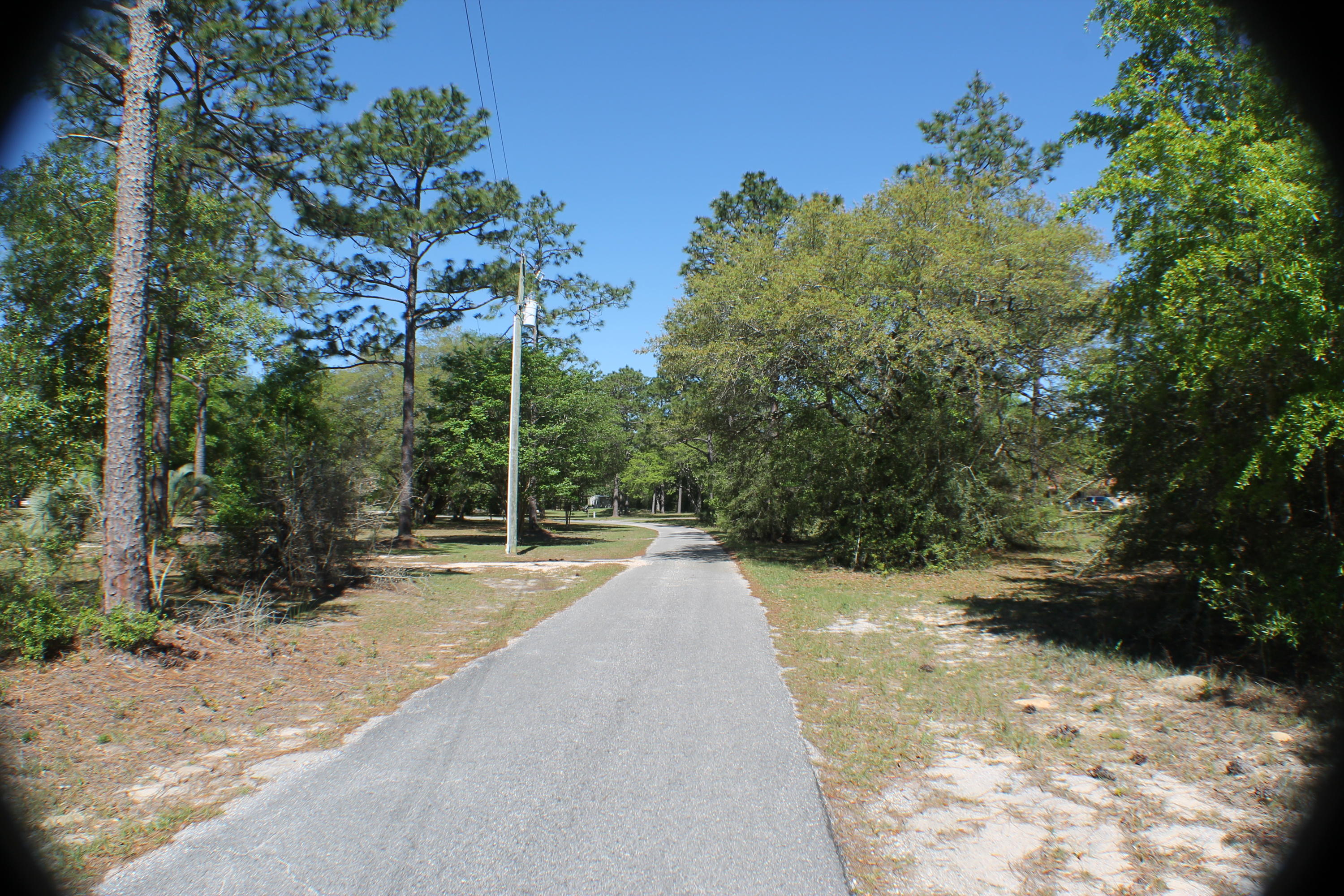 Bring your house plans!! 1.91 AC level ground to build you dream house!! Lovely neighborhood and additional land available!!