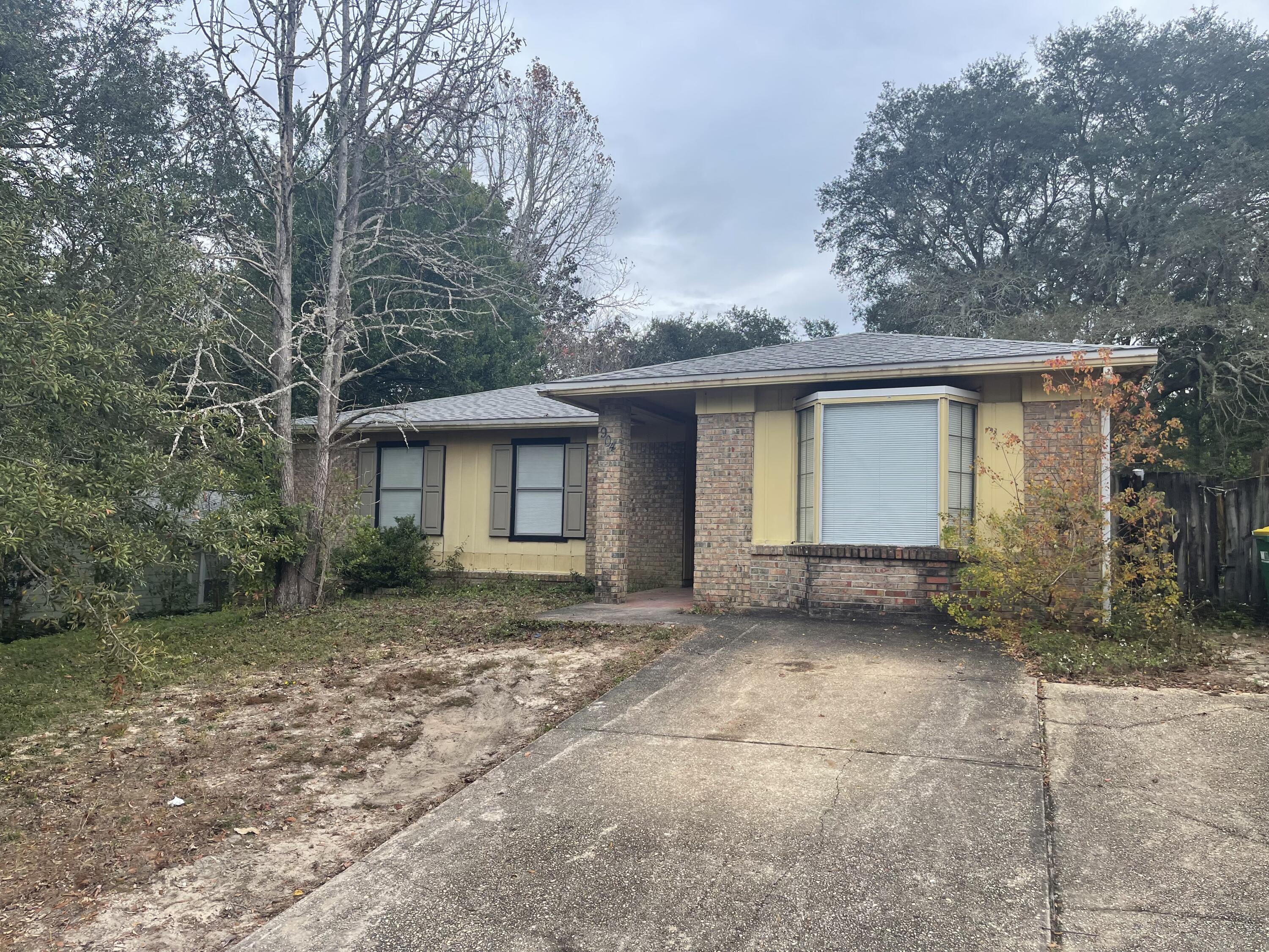 This 3 bedroom 2 bath home is waiting for you.  Close to the high school. Newly painted and new flooring adds to the charm of this ranch style home.  As you enter the home you will notice a very large living area with plenty of room for oversized furniture.  Kitchen has plenty of cabinets, a pantry for storage, and a pass through window for you convenience.  You will find a handy breakfast nook attached to the kitchen. Screened in back porch for entertaining your family or friends.