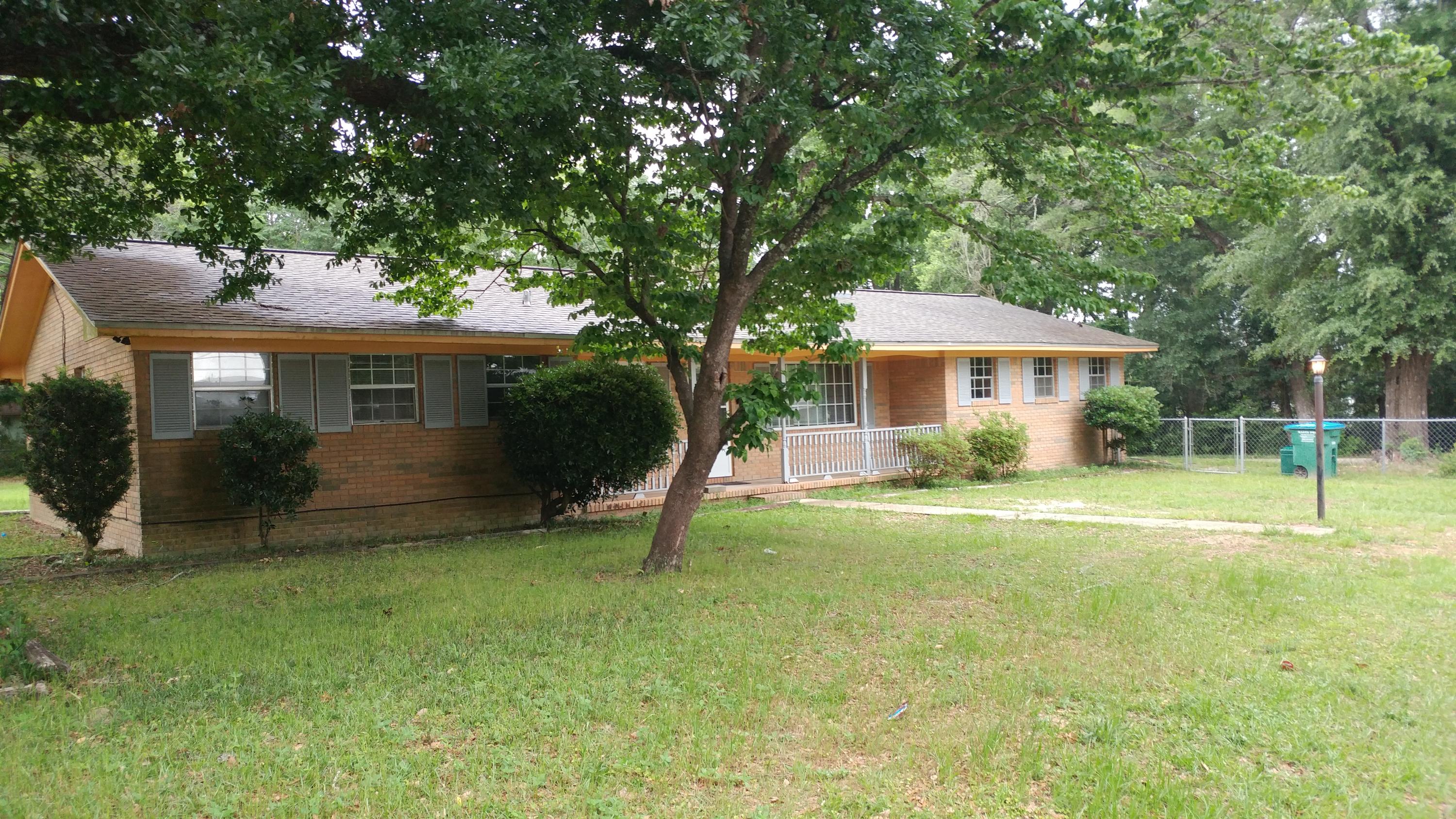 Don't miss out on this brick home within walking distance to Twin Hills park and the college. This home offers a fire place, enclosed back patio, open deck, fenced back yard, breakfast bar and lots of square feet. No Pets. Get more information about our application process online at www.robyresidential.com.