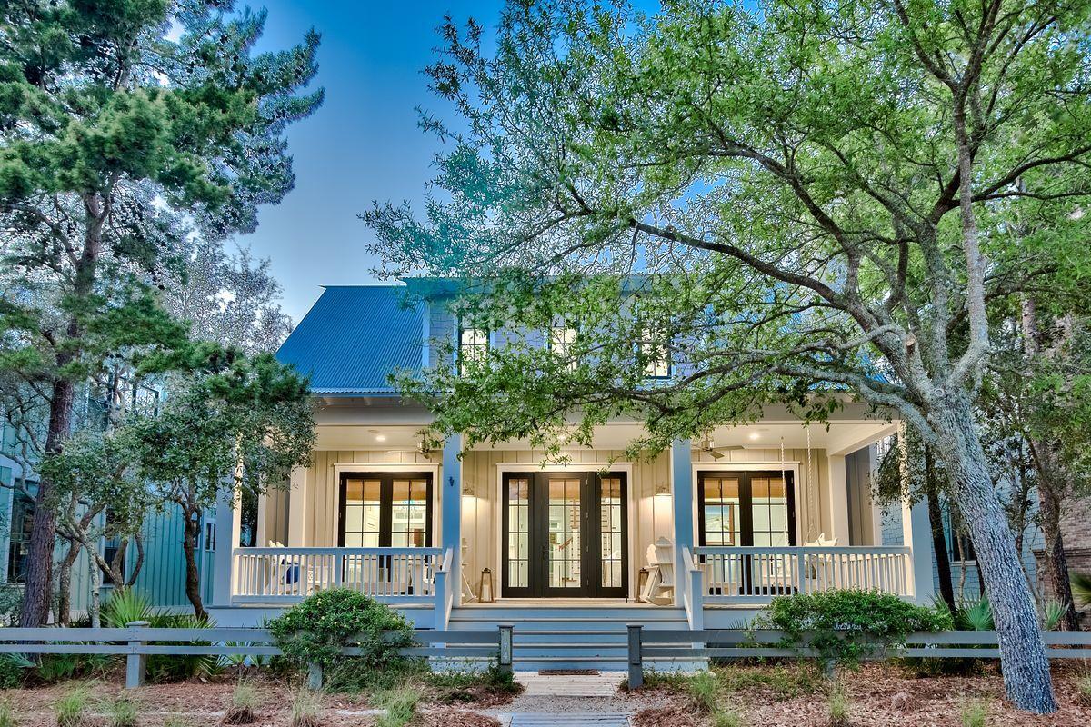 Beautifully renovated and primely located in Phase III Watercolor, this exceptional 3,502 square feet, six bedroom home features premium finishes with unparalleled interior design and professional decor. Characterized by southern elegant architectural design, this charming coastal retreat makes the perfect secondary home with easy beach access and great short term rental opportunity. Notable features include premium ship lap walls, southern style porches on both the front and rear elevation, custom wood tray ceilings, reclaimed heart of pine flooring, central vacuum system, Sonos speakers in every room as well as ample parking on this over-sized homesite. The chef's kitchen masterfully anchors the spacious open floor plan and is finely appointed with a beautiful gas range, stainless appliances, custom cabinetry with ample storage as well as a sizable center island which is perfect for entertaining. The chef's kitchen is open to the gorgeous living room & dining area which feature custom lighting, gas fireplace and plenty of seating. Other notable features include a first and second floor master suite as well as two additional bedrooms with en-suite bathrooms and two large bunk rooms. Each floor offers an additional office space, private laundry and lock out closet which makes it perfect for multiple families gathering in one place. Situated on an expansive lot, this home also offers the opportunity for expansion for either a possible private pool, garage or carriage house (subject to ARB approval). This property is central to all of the world class amenities in Watercolor including the new private beach club as well as close proximity to many other activities with it's central positioning along 30A.