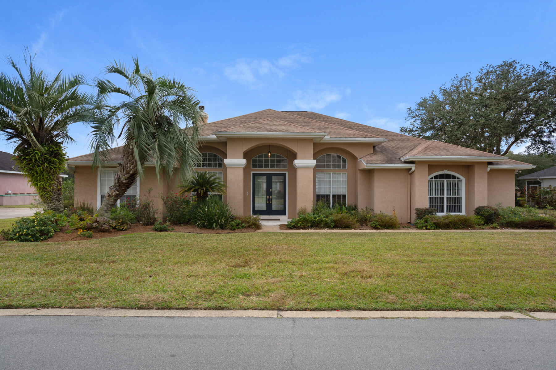 PRIVATE & SCREENED IN-GROUND POOL! This lovely home captures Florida living at it's finest! As soon as you enter your home, you are greeted with an amazing view through the sliding glass doors of your spectacular and refreshing pool and a portion of the golf course. This home has a split bedroom plan and boasts cathedral ceilings throughout! Kitchen has updated stainless appliances that features a gas stove with a double oven and a French door refrigerator with the freezer at the bottom. Home has an additional breakfast area overlooking the pool, formal dining room and additional room for an office or play area. Pool service AND yard service included! Owner will also DOGS only up to 50lb!! What more could you ask for in this gated, golf-centered community. *MUST GIVE 18-24 HRS NOTICE*