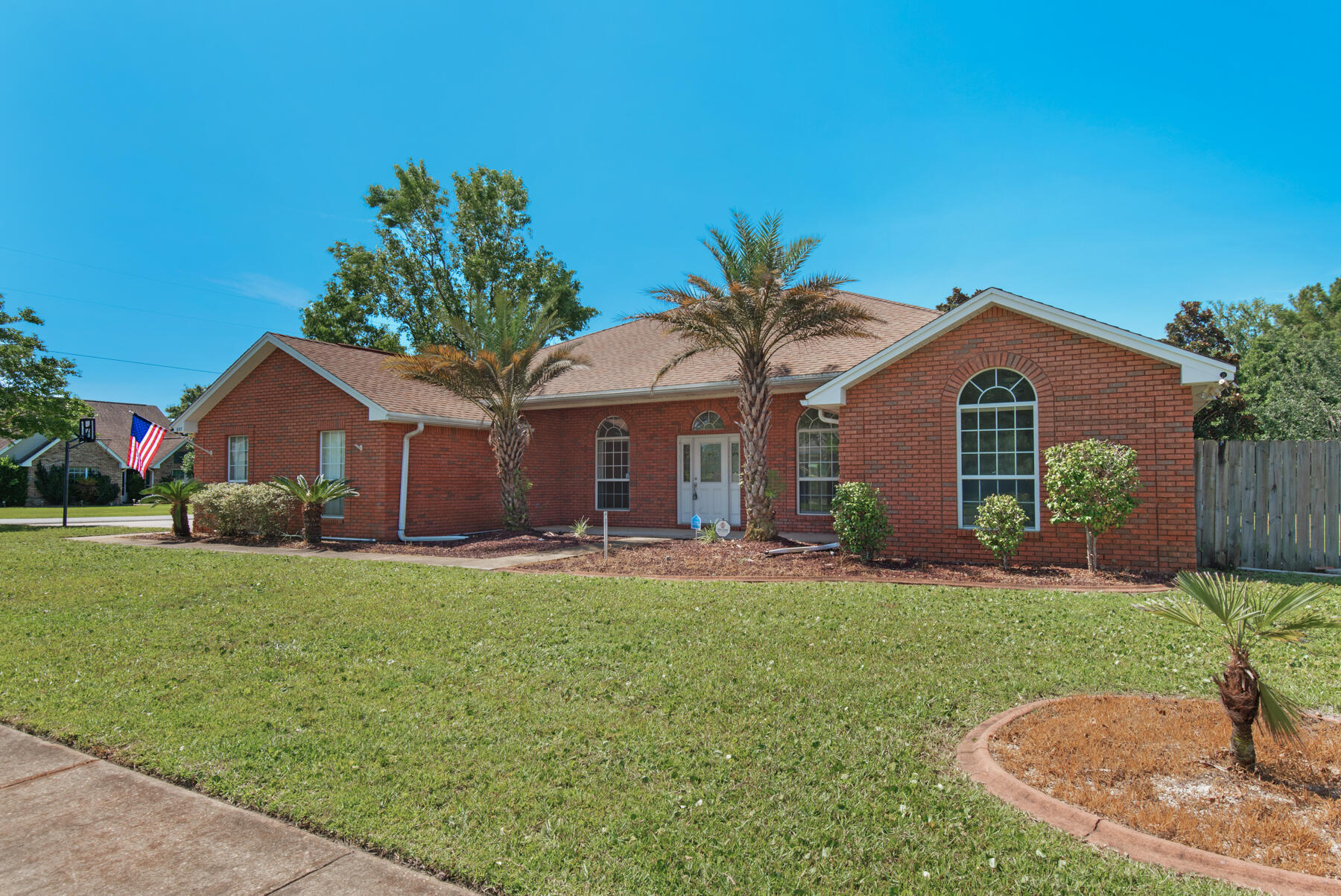 Under Contract with Kickout Clause & accepting backup offers now. New A/C & roof coming soon! Lake front, 1/3+ acre corner lot only 3mi West of Hurlburt Field. This striking contemporary has plenty of room to grow into with large bedrooms all the way through. The huge foyer says 'come on in' while the kitchen will allow you to let it all hang out conveniently with its well laid out plan. This single story 5BR and additional 550sf (that is also heated/cooled) sunroom will allow you to surrender to the comfort of home. Jack & Jill bathrooms help ensure availability and privacy for all. Master bath includes separate garden tub & shower; master bedroom has two separate closets. Oversized driveway. Property is located on the lake, great for relaxing and/or fishing!