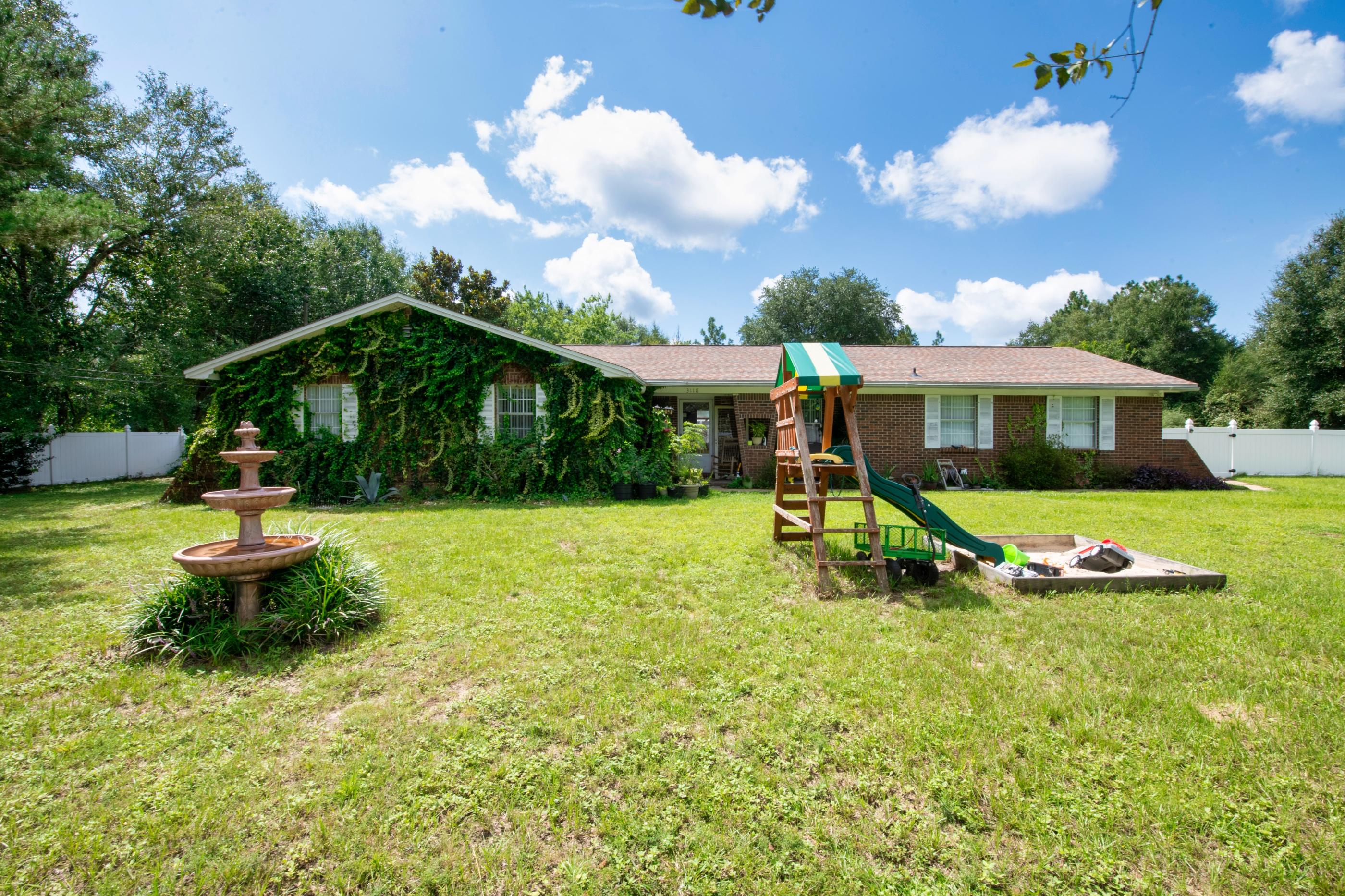 Brick Ranch style home located on a 1 acre lot. Spacious kitchen features a breakfast bar and tons of cabinet space. Extra large utility room offers additional storage space. The private fenced in backyard features an in-ground pool.