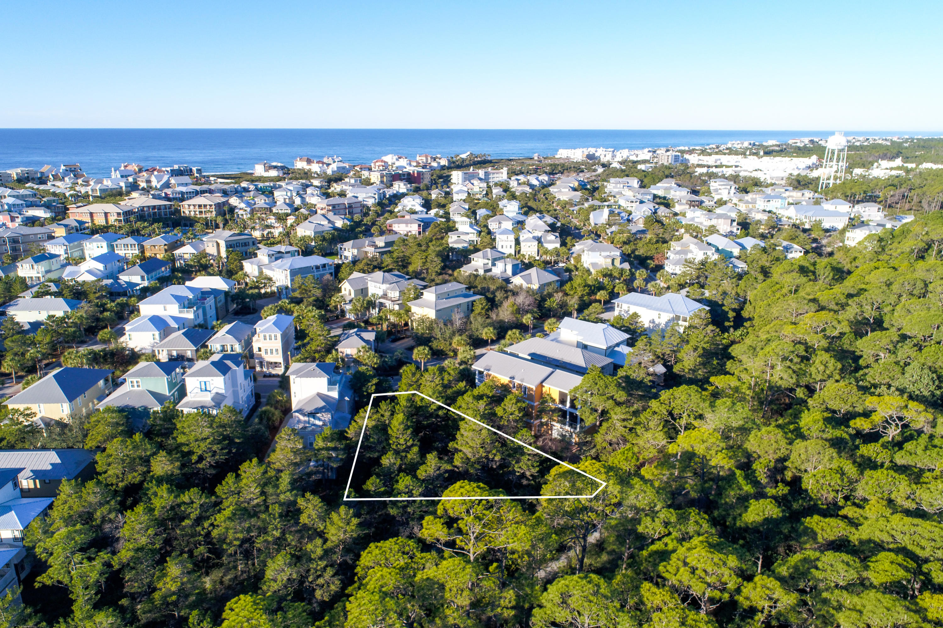 Price improvement. This homesite is perfectly situated with a paved walkway across the street to the 12,000 square foot pool with fountains and waterfalls and. Current owners have had a change of plans and now this rare opportunity to build your dream beach home on one of of the largest remaining lots in Seacrest Beach is yours. Build the home you've been dreaming about. Add a pool and/ or carriage house with privacy and seclusion abutting nature preserve and walking trails. The Seacrest Community hosts a complimentary tram service to & from the deeded beach access. Walk to many shops along 30A, fine and casual dining in nearby Rosemary Beach and Alys Beach, concerts, bike trails, golf, movie nights & more. The prime parcel of land is unlike anything offered in the area today and an absolute must see! Imagine after a fun filled day playing in the nearby sugar white sand and emerald waters then retreating to your newly built custom beach home that accommodates everything you have wanted in a property.