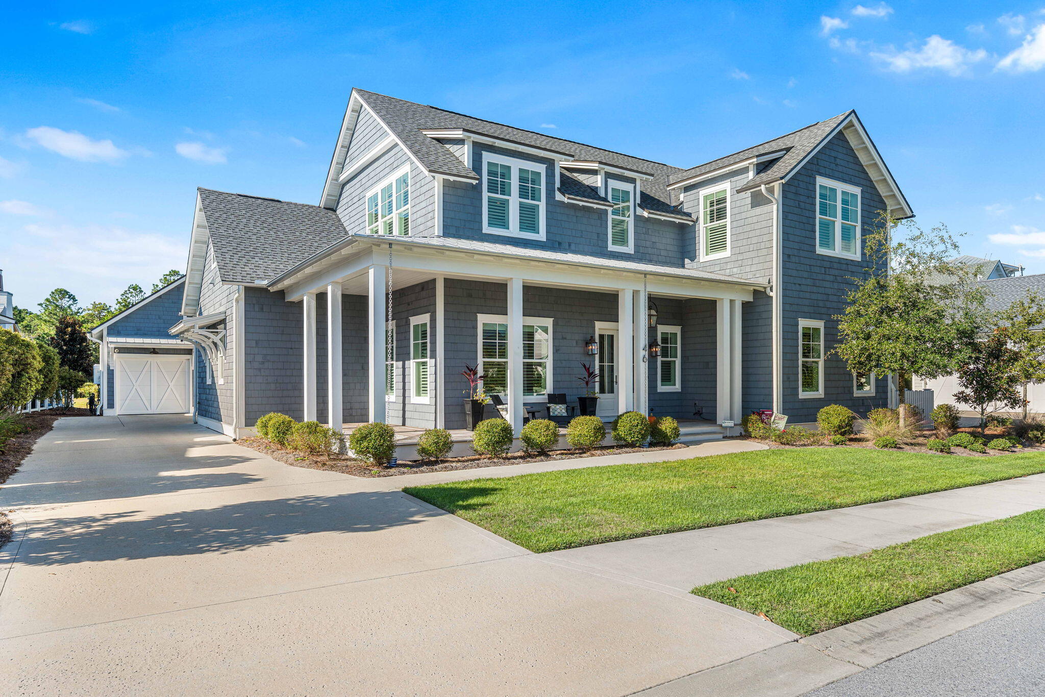 This lovely coastal residence combines effortless charm with sophisticated design in the highly sought-after Watersound Origins community. Crafted by Dune Construction this exceptional home sits on a premium lot in the prestigious Stillwater neighborhood, offering both privacy and elegance and was designed for flexible, luxurious living. The open-concept main level welcomes you with lofty 11-foot ceilings, wood beams, hardwood floors, and shiplap accents. A wall of windows creates a bright, inviting space in natural light, while the gas fireplace anchors the space in warmth and style. The gourmet kitchen is a chef's dream, featuring Wolf and Sub-Zero appliances, marble countertops, custom cabinetry, and a large center island for casual dining. Flowing seamlessly into the dining and living areas, this space is ideal for entertaining, enhanced by a convenient first-floor primary suite complete with a freestanding tub, large walk-in shower, expansive closet, and direct access to the laundry room. Upstairs, three additional bedrooms provide ample space and storage, with custom cabinetry and generous closets. A second-floor den offers an inviting space for gathering, complemented by a media or study area that enhances the home's flexibility and function. Outdoor living includes generous covered porches with durable Ipe decking, a built-in gas grill, and a mini-fridge. The private pool and spa are complemented by a well-designed cabana with a fireplace, ideal for casual entertaining. The spacious yard and porches provide plenty of room to relax, enjoy the outdoors, and take in the coastal breezes.

Watersound Origins offers an unparalleled lifestyle, blending natural beauty with modern amenities. Residents enjoy the Village Commons, featuring a resort-style pool, fitness center, pickleball and tennis courts, an event lawn, plus access to the Origins Golf Course, Lake Powell, scenic walking and biking trails, and an upcoming Art Park. The nearby Watersound Town Center provides convenient dining, boutique shopping, grocery, and medical facilities, while the famed beaches of Highway 30A are only two miles away.
This home embodies the perfect combination of luxury, functionality, and coastal elegance, offering a truly unmatched living experience in one of South Walton's most desirable communities.