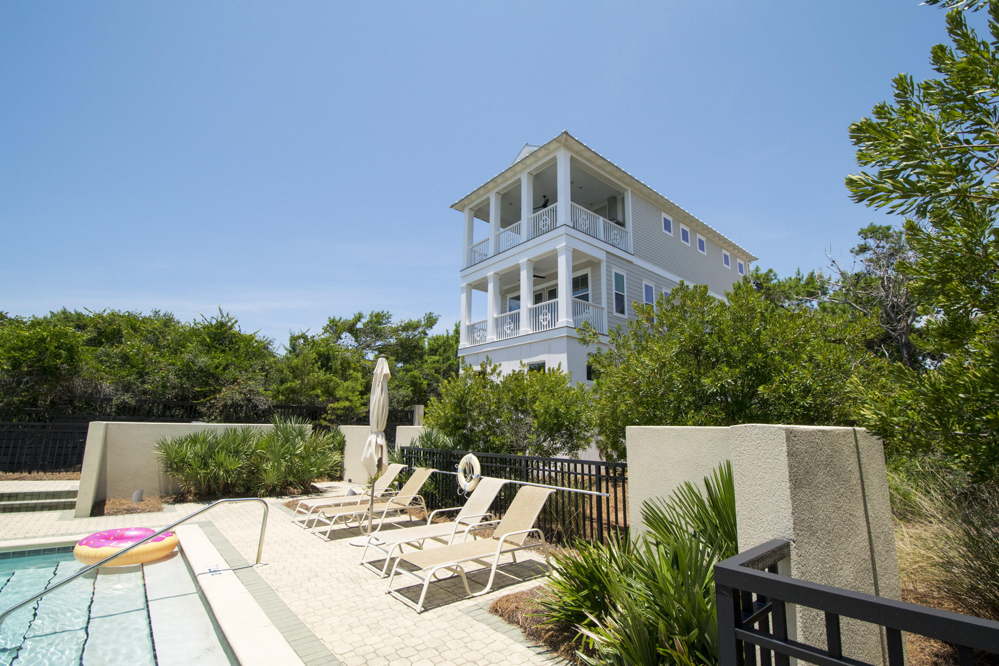 Mariner's Retreat, at Park Place at Inlet Beach, is a sophisticated version of the classic beach cottage. The second and third floor porches provide panoramic views of the gorgeous dunes, sugar-white sand beach and emerald green and azure waters of the Gulf. The spacious, flowing plan of the first floor easily transitions from intimate formal dining to casual entertaining. Our interior designer has carefully selected the color palette, fixtures and accents that make this home stylish, yet comfortable for the best in living at the beach. Mariner's Retreat was designed for the discerning home buyer and features high-end, custom amenities. The Better-Built difference is evident in the finish details in this home that include: unique light fixture, natural gas fireplace, oak wood floors throughout, honed-marble tile floors and marble vanity tops in all bathrooms, glass tile accents, freestanding crushed marble tub in Master Bath, seamless glass shower enclosures, wood- accented vaulted ceilings at third floor bedroom and bonus room, Grill Center at third story porch separate HVAC units for each floor, security system and Wi-Fi throughout, prewiring for bonus room surround sound system and speakers in the living area, master bedroom and third floor porch, coastal shelving in all closets and 2-10 Home Buyers Warranty. Complimenting this list of features is the superb craftsmanship that comes with every BetterBuilt home.