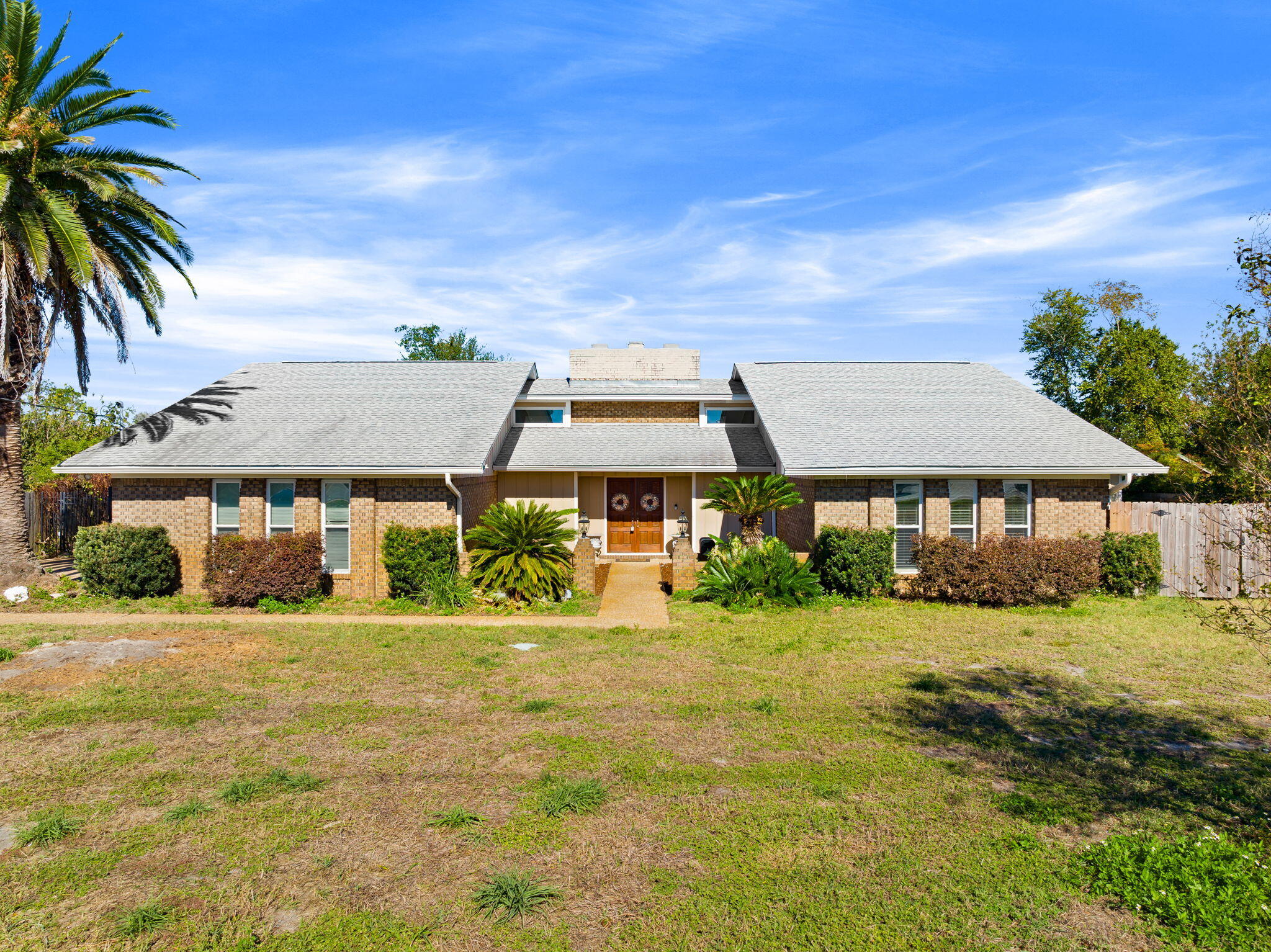 Welcome to your next investment — not just a home, but an opportunity with future rezoning potential! This spacious residence sits directly off Hwy 390, offering both convenience and flexibility under Bay County (not Panama City) jurisdiction — meaning lower property taxes, fewer restrictions, and room for creative use. Enjoy gardening, raise chickens, or explore the option of converting this into your next business front (inquire about rezoning possibilities). Location is key! Centrally positioned in the heart of town, you'll be close to dining, shopping, schools, and local amenities.