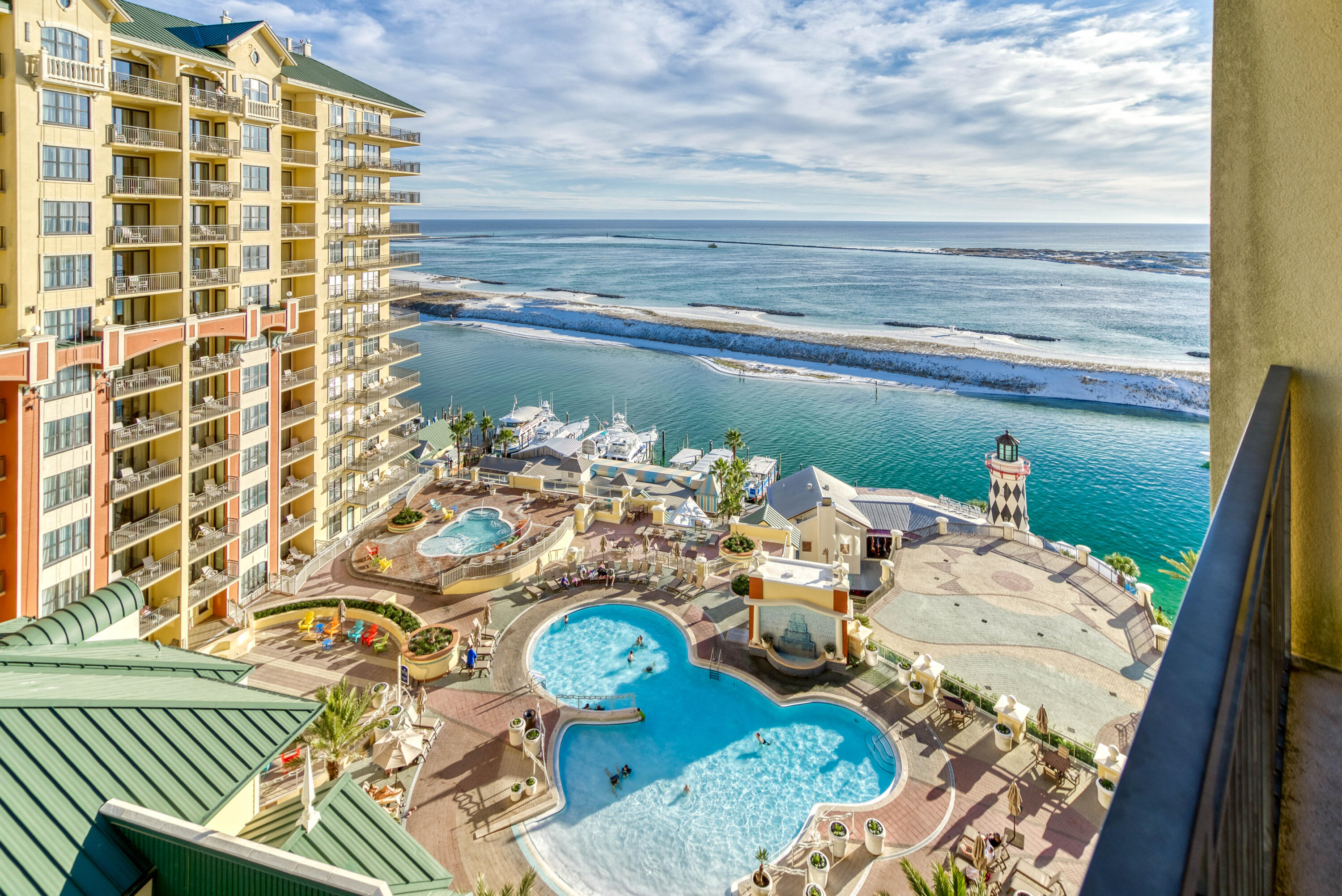 Welcome Emerald Grande W1021 a beautiful 2 bedroom (plus a full bunk room), 2 bathroom condo in the most sought after resort in Destin. Master bedroom has it's own private balcony and another balcony is located right off the living room where you can see unmatched views of the Destin Harbor, East Pass and Gulf of Mexico. Emerald Grande boasts  amenities you can't find anywhere else in town including outdoor zero entry pool, indoor pool, 2 hot tubs, fitness center, onsite spa and restaurant and so much more!!  Emerald