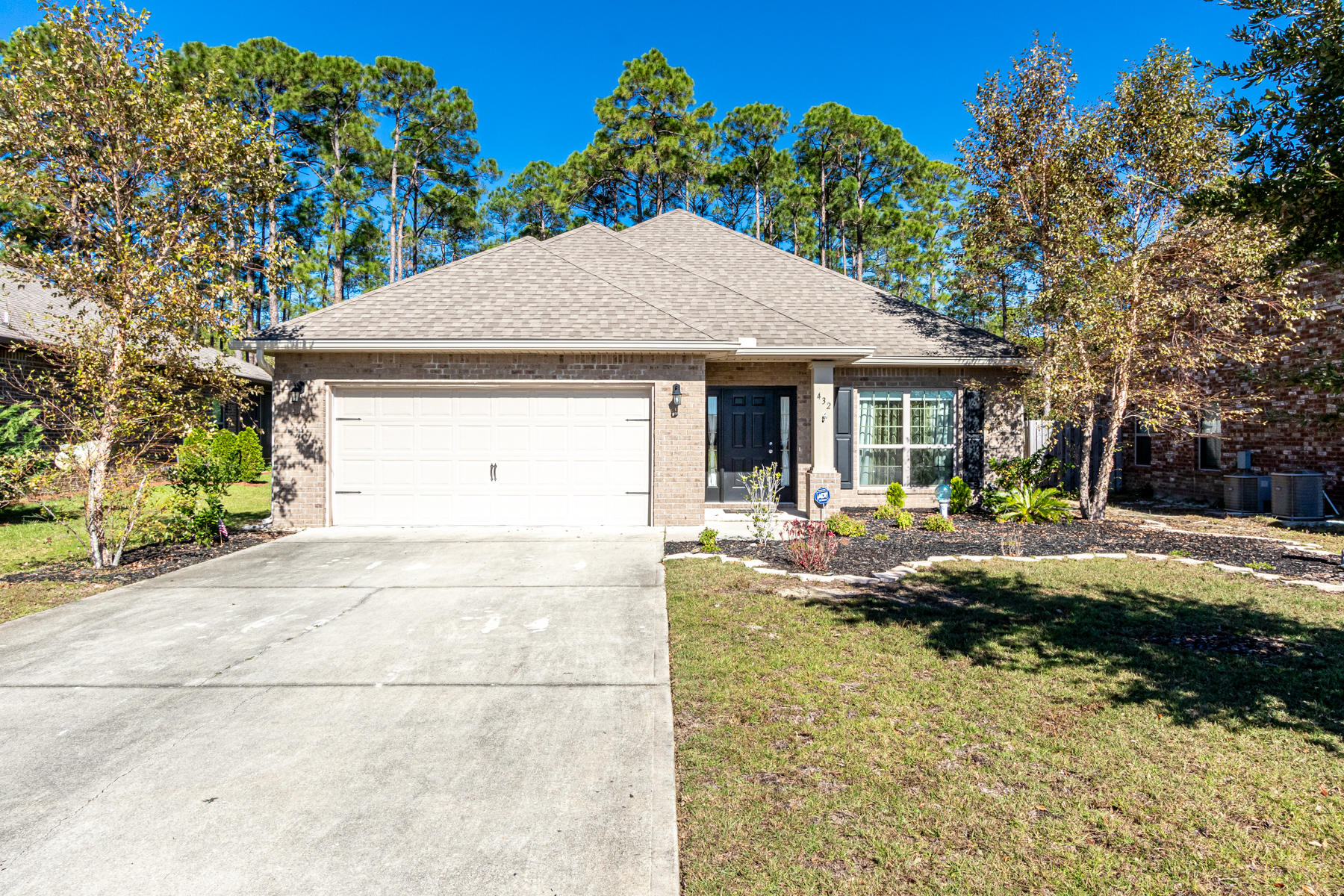 Welcome to 432 Cocobolo Drive! This spacious open floor plan featuring 3 bedrooms, 2 baths, office/formal dining area and 2 car garage is located in the highly desirable neighborhood of Driftwood Estates. This home is situated on a large lot up against the trees creating a perfect blend of indoor and outdoor living. This well maintained home offers engineered hardwood floors in all of the main living areas, granite countertops, elegant tray ceilings, stainless steel appliances, additional cabinets in the laundry area, ceiling fans in all the bedrooms, separate stand up shower and soaking tub in the master bathroom. The back covered patio is screened in offering a great place to entertain or relax with nature while over looking the preserve.  Driftwood Estates Community is a sought after neighborhood situated minutes from the Beaches of South Walton and 30A. Community features include a well maintained Community Pool, ponds, sidewalks, street lights, parks and beautifully landscaped common areas. Driftwood is positioned minutes from Sacred Heart Hospital, Top-Rated Schools, shopping, dining for all occasions, entertainment, Sandestin Golf and Beach Resort and Grand Boulevard.
*Buyer is responsible to verify all matters of importance.