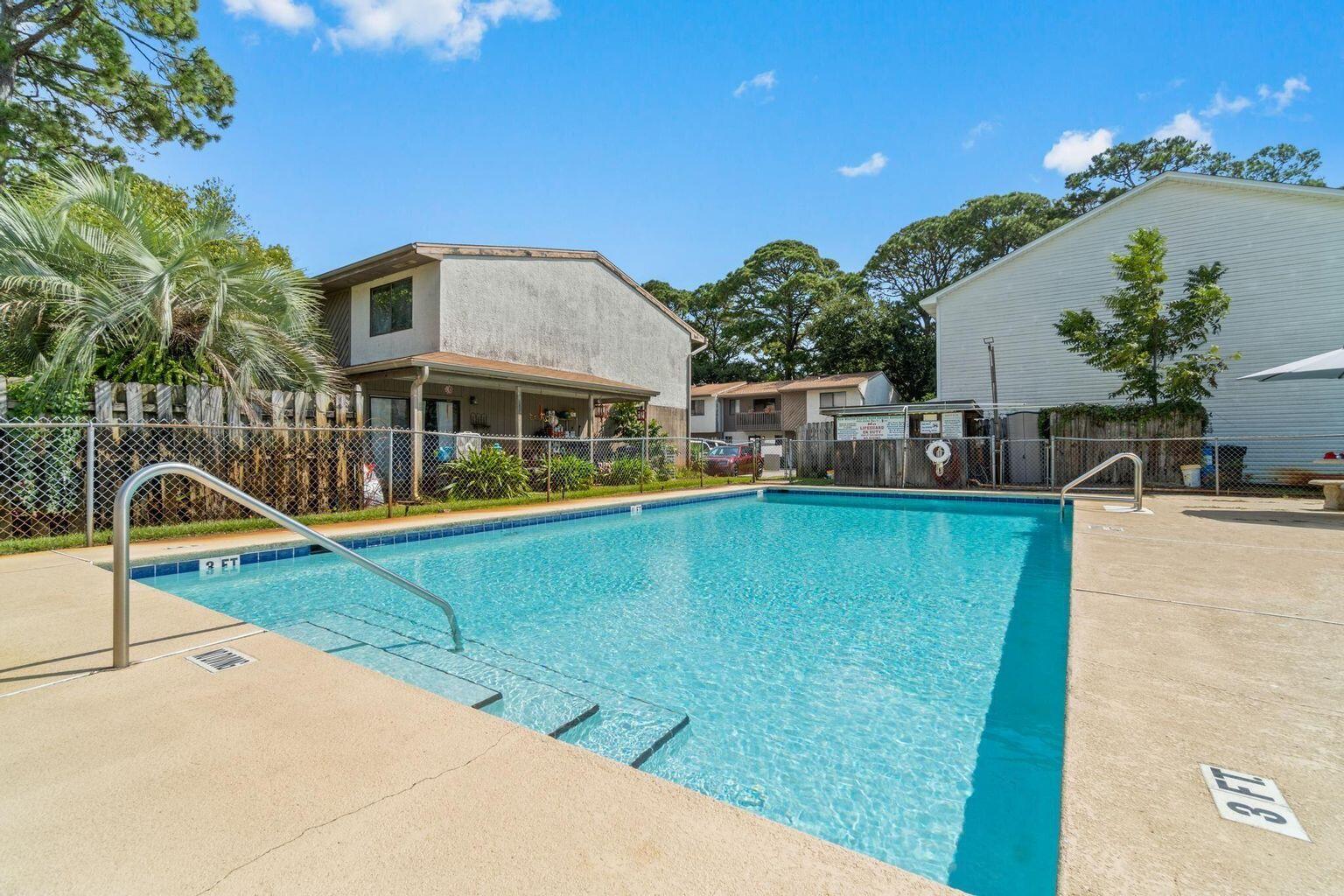 This 2b/2b townhouse is centrally located in downtown Fort Walton Beach, within walking distance to Publix.Both bedrooms are located on the second floor with a large bathroom and laundry room between.6.4 miles from Eglin AFB; 7.3mi from Hurlburt Field; less than 1mi to Okaloosa Island.There is also a community pool for use in the summer! The neighborhood amenities include a public boat launch and water access, parks, disc golf, tennis courts and walking trails. The fenced in yard is the ideal place to store your bike and outdoor equipment. This home is being sold as is . Roof 2015