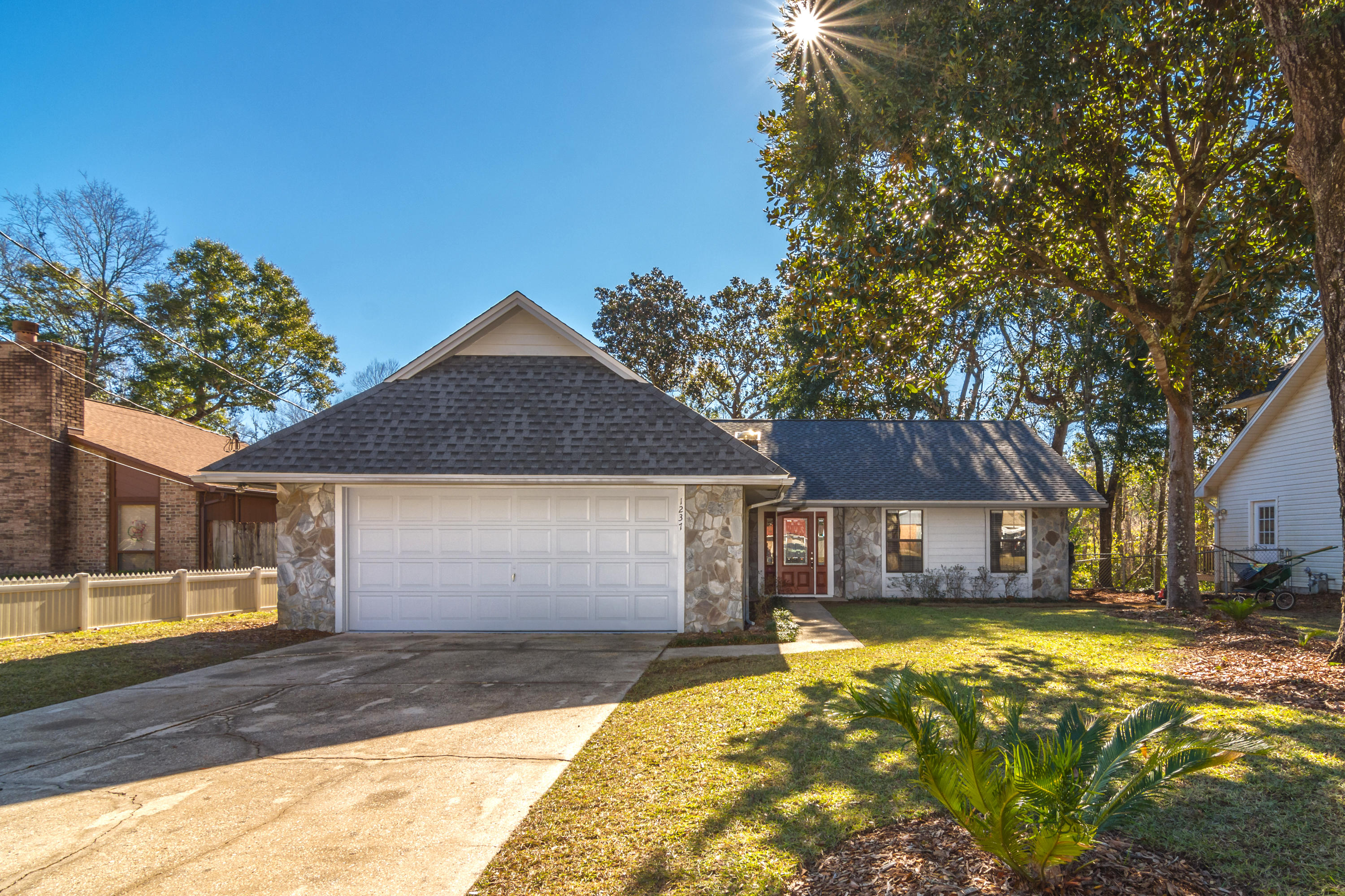Fully remodeled 3 bedroom and 2 bath home with 1504 sq ft located near Ruckle Middle School, Niceville High School, Eglin Air Force Base, shopping, and restaurants! This move-in ready home has been extremely upgraded to include new roof, two new skylights, new exterior siding, front door, sod, irrigation system, wood plank tile throughout main area, new carpet, blinds, all interior doors, hardware, vanity's, all appliances in the kitchen and the hot water heater, refinished marble tubs in both bathrooms, back splash, granite counter tops throughout, soft closed doors, lighting, new toilets, freshly painted interior and exterior, and so much more. This beautiful home has been completely remodeled from exterior to interior in a very sought out neighborhood.