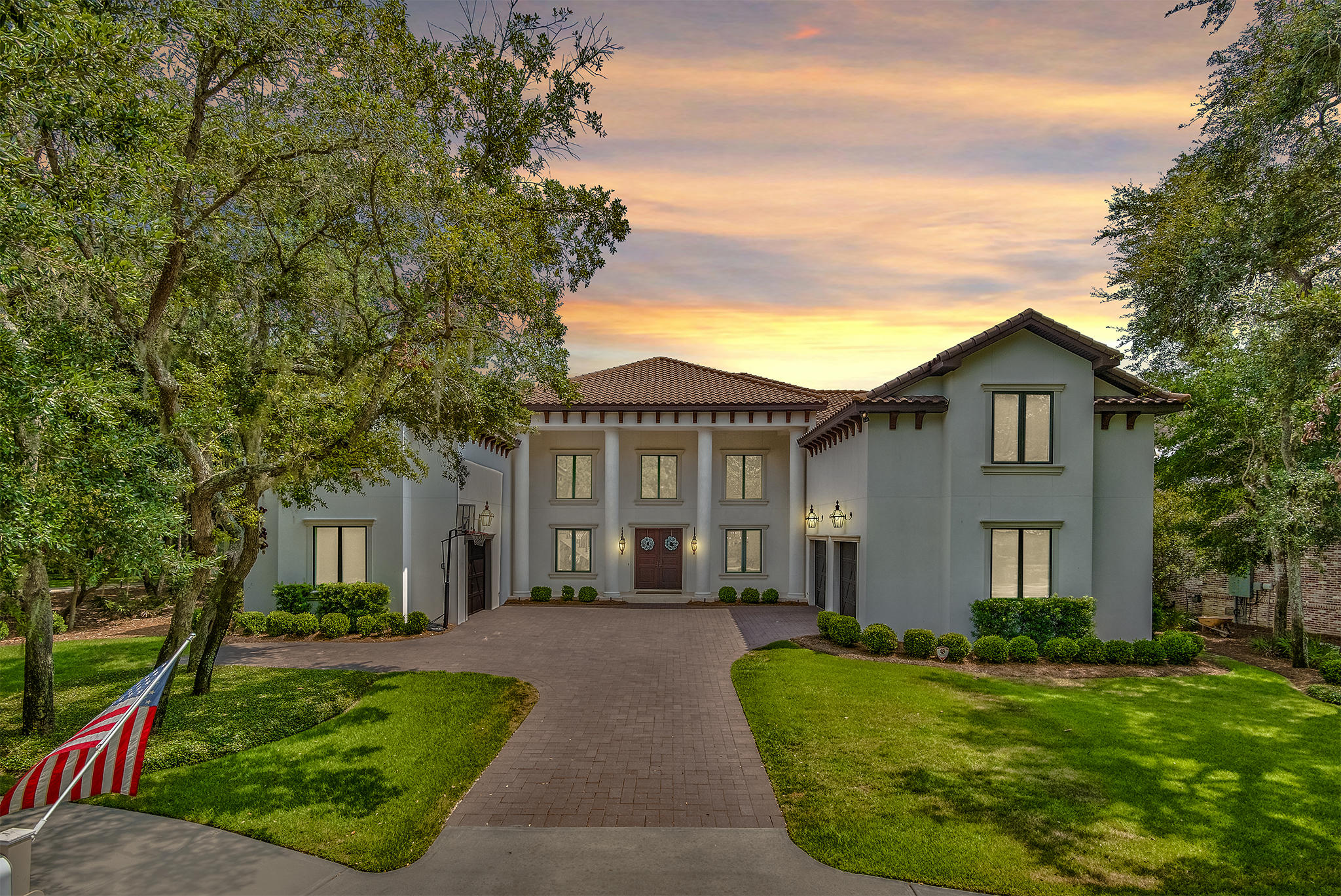 This Modern Italian Villa is located on the secluded street of Olde Plantation Place in Kelly Plantation is perfect for a large family that loves to entertain.  This home boasts 6-bedrooms,  5-full and 2-half baths.  Approaching the home, you will be greeted by numerous Bevolo copper gas lanterns and monumental white columns.  Upon entry, the 20'+ trayed ceilings, floating staircase and breezeway set the ambiance of the home.  The first floor features an open dining area, large family room and  wet bar, along with a television and fireplace finished with white brick Nepal stone.  The large kitchen is a chef's delight featuring an oversize island, dual Subzero refrigerator/freezer, Wolf range, prep sinks and a casual dining area overlooking the pool lanai. The master suite features his and hers closets along with a spacious master bath complete with Kohler Hydromassage soaking tub, large multi-function shower, double vanities, heater floors and private washer and dryer. Automated window coverings are featured for each of the master windows and the door leading to the pool lanai.  On the opposing side of the first living level you will find a complete guest suite along with another guest bedroom and half bath.  The second floor features (3) guest bedrooms, playroom, secondary laundry room, conditioned storage area and a private office that could be used as a 6th bedroom. 

The pool lanai area features a large estate sized heated swimming pool complete with hot tub, elevated natural gas fire pit, complete outdoor kitchen along with TV and a full screened enclosure.   

Buyers can relax and enjoy the creature comforts provided by the natural gas Rinnai tankless hot water heaters, pool heater and the Generac Emergency generator that is always on standby to serve a portion of the home.  An electric fence for the front and rear of the home is also included for the pet lovers. Buyer to verify all dimensions.