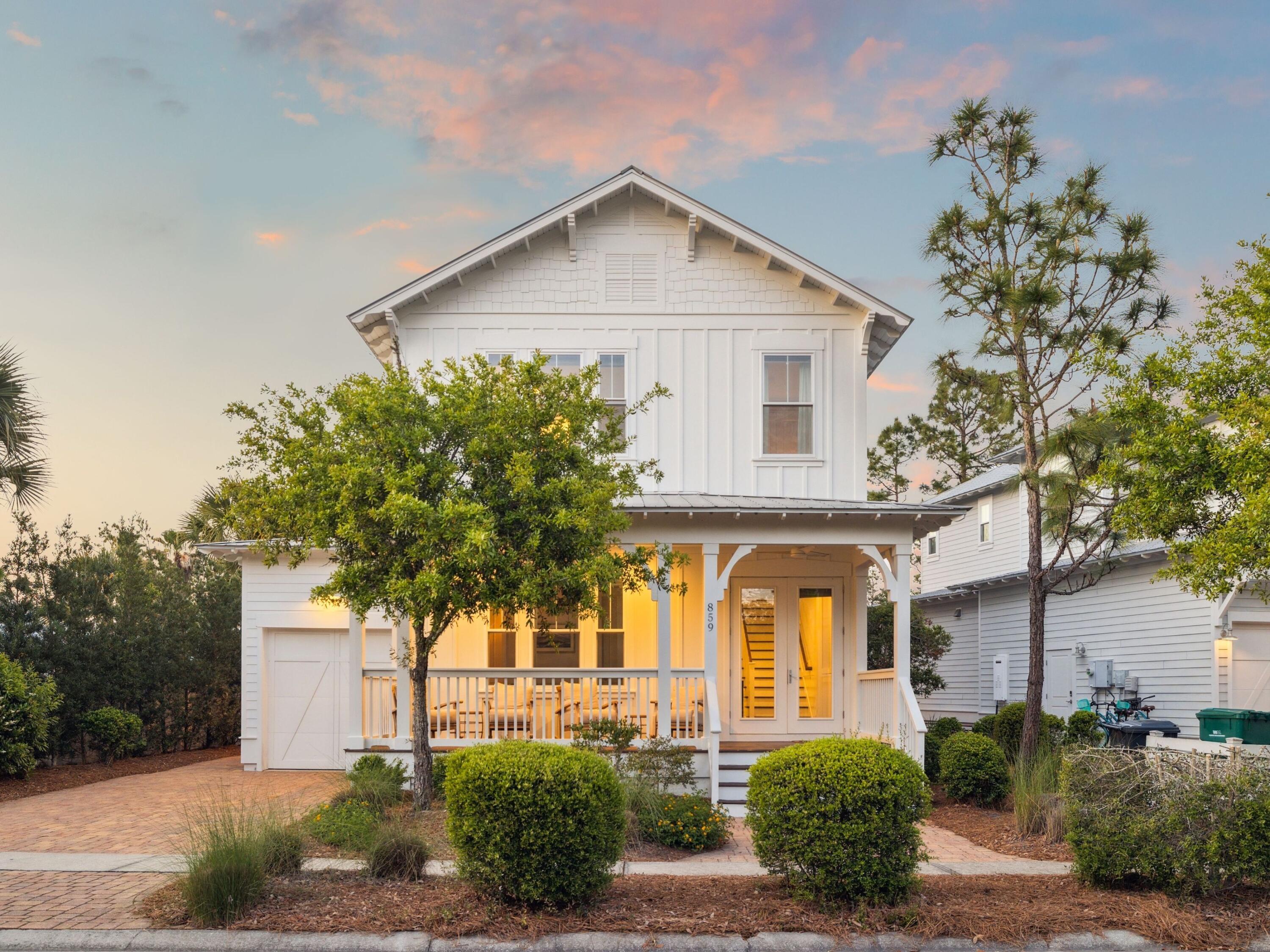Welcome to 859 Sandgrass Blvd — a fully furnished and beautifully updated 5-bedroom home in the sought-after community of NatureWalk at Seagrove. Ideally located just steps from the pool, playground, and nature trails, this move-in-ready home blends style, space, and convenience — with room to add a private pool.

The open main level features a renovated kitchen with quartz countertops and new appliances, a custom tile fireplace, new lighting, and French doors leading to a covered porch and fenced backyard with direct access to the community pool. Downstairs offers a guest suite and custom-built bunk room, while upstairs includes three guest rooms and a spacious primary suite with a private balcony and spa-like bath.

Extras include a Tesla charger, new paint inside and out, an outdoor shower, and paver walkways.

Whether as a full-time residence, second home, or investment property, 859 Sandgrass Blvd stands out in one of 30A's most desirable, amenity-rich communities.