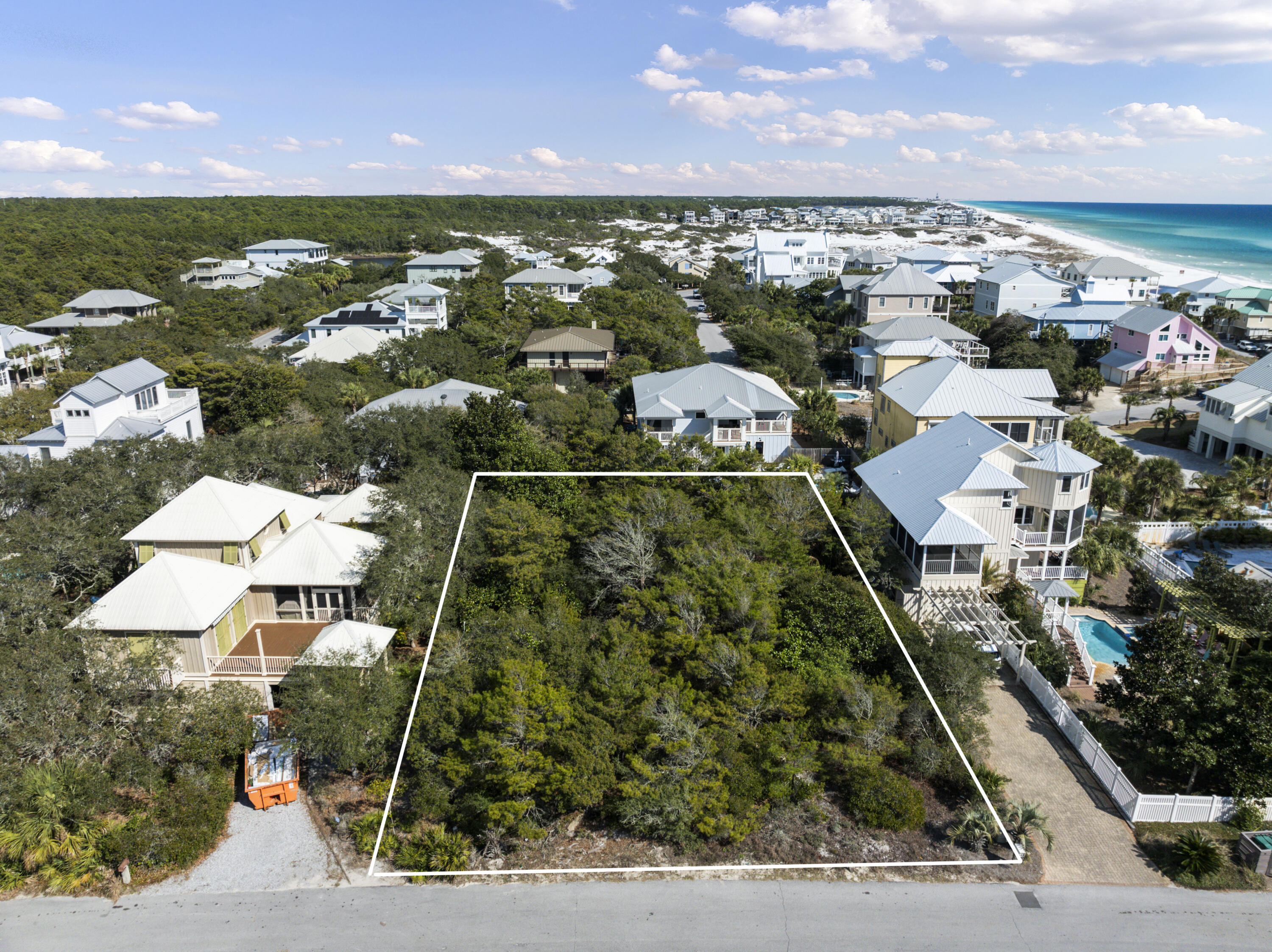 Envision your coastal beach escape in Gulf Trace. Located in the exclusive Gulf Trace Community along the highly coveted 30A coastline, this 4th tier lot presents an extraordinary opportunity to create your perfect beachside retreat. 

Just steps from the neighborhood beach walkover, this prime homesite offers effortless access to the sugar-white sands and emerald waters of the Gulf of Mexico. 

Set within a private, gated enclave, Gulf Dunes is renowned for its natural setting, bordering Grayton State Park and cultivating a peaceful community. This low-density neighborhood offers unmatched privacy and exclusivity. As the only available lot in this prestigious community; this property is a rare gem along 30A. Boasting a generous 80x125 footprint, the lot offers ample space to design your dream home with potential for breathtaking Gulf views and awe-inspiring sunsets. The conceptual renderings provided showcase the possibilities, sparking inspiration for a stunning future residence tailored to your vision.

As one of the few gated, private, west end beachfront communities along Scenic Highway 30A, Gulf Trace ensures a lifestyle of tranquility, luxury, and refined coastal living.

Don't miss your chance to join this exclusive enclave and secure your own slice of paradise. Schedule your viewing today and begin building the 30A retreat you've always envisioned.