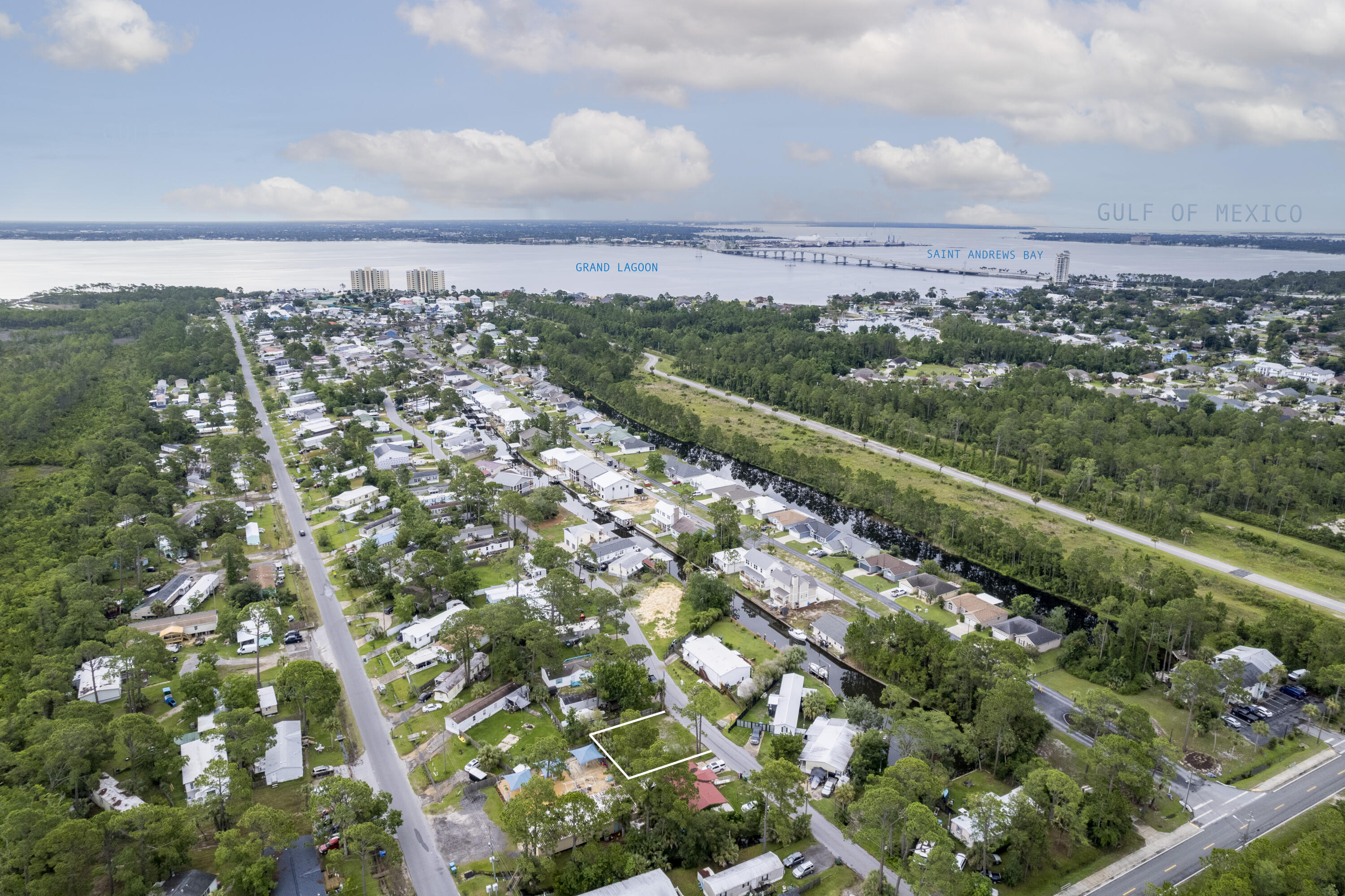 Vacant lot conveniently located in Panama City Beach just a short distance from The Bayside Marina, Grand Lagoon and Hathaway Bridge.    This .08 vacant lot with no HOA is the perfect location to make your own.