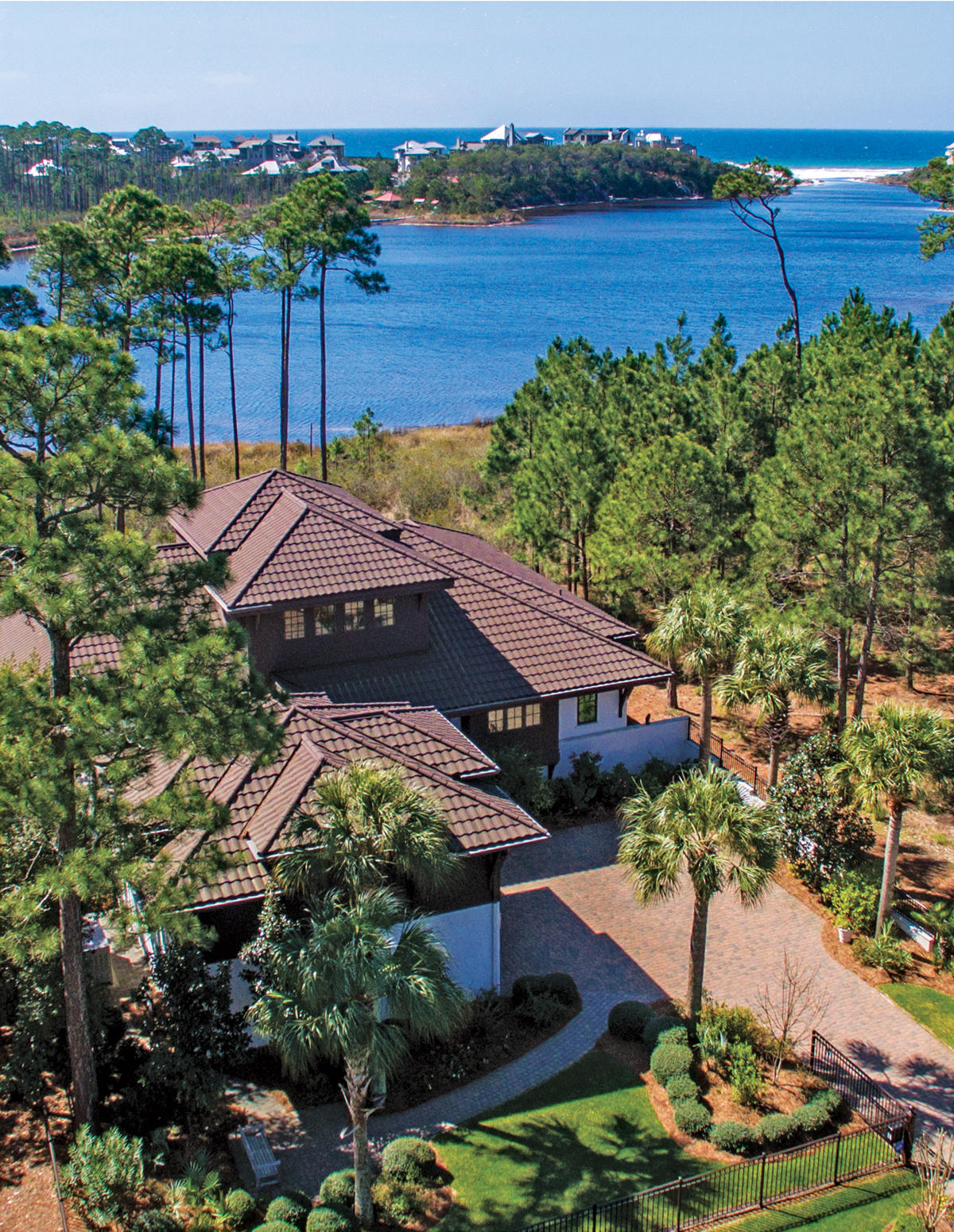 ENORMOUS PRICE REDUCTION!!! BEST WATER-FRONT VALUE ON 30A!!! This gorgeous home on scenic Draper Lake offers the best of the 30A lifestyle in a beautiful and private setting within the exclusive gated community known as Crescent Caye. Fabulous views across the stunning, rare, and ecologically-treasured coastal dune lake to the shimmering white sand dunes of the Gulf of Mexico--accessible via a quick kayak or paddleboard ride--enhance the beautiful interior and exterior design and finishes of this magnificent waterfront estate! The impeccable 6-bedroom, 6-1/2 bath home combines superb craftsmanship, an eye for artistry, and a passion for the very best--and it's being offered fully furnished. Its stellar construction includes concrete block exterior walls reinforced with rebar... ...and solid concrete cores, a powder-coated metal roof wind rated to 225 mph, Pella wind-rated windows and exterior doors, five HVAC systems, and a new Generac generator large enough to power the entire home! 

The main floor living/kitchen/dining area features gorgeous views, an open floor plan for entertaining, a Tabbystone fireplace, English Walnut and Travertine flooring, hard maple cabinets and bookshelves custom made by Hampshire Cabinets in Ohio, solid surface countertops, and artistic, modern fixtures. Also on the main level are the master suite, with more great lake/gulf views; a study area; and balcony seating overlooking the custom-designed, heated salt-water resort-style pool, kiddie pool, and large hot tub. 

With its living/sitting room, galley kitchen, and a second laundry room, the lower level is like another residence. Cedar shake accentuates the kitchen ceiling, while beautiful ebony tile accents the wall and backsplash. Four bedrooms and baths will accommodate plenty of guests or provide room for all your hobbies. Children will joyfully gravitate to their nautical-inspired retreat, which has 4 bunks with portholes, vibrant colors, and a coordinating bath. A sitting/living room overlooks the outdoor patio and pool area with its outdoor fireplace. The third floor includes a family/game/party room with wet-bar and a balcony with more great views. A charming carriage house with wet-bar boasts the same great quality as the rest of the home. 

Gorgeous landscaping surrounds the home, including an arbor on the walkway to the dock on Draper Lake, which includes water and electricity, and a new electric-gated aluminum fence delineating the estate's expansive boundaries. This beautiful property has been maintained with exceptional care--a very special residence for a discerning family that wants to enjoy the relaxed 30A lifestyle without compromising privacy, quality, or space!  Buyer must verify all information and specifications.