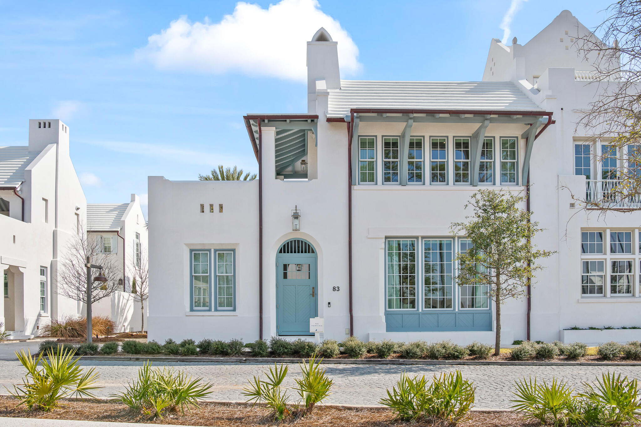 83 Plumbago Lane is a newer construction custom Alys Beach home designed by Jason Dunham and built by Alys Beach Construction offering an ideal combination of outdoor and indoor covered and uncovered living spaces. Located near Alys Beach's newest amenity, The Silva. The corner location of this home fronts a pedestrian path and looks out to a protected conversation area ensuring separation from other homes for the years to come. 
First floor living is at it's best as this larger site enabled two first floor bedrooms, a kitchen/dining/living area looking out to an oversized private courtyard/pool area along with a two-car garage. The second floor offers a large additional living room that opens to a rooftop terrace and large covered loggia with sitting areas. Two additional bedrooms and custom built out bunk room complete the second floor. 

Professionally designed interior furnishings complement the upgraded fixture/finishes that are found throughout this house. With its exquisite architectural details and premium location, this Alys Beach home is an exceptional sanctuary in the most coveted town on the Emerald Coast.