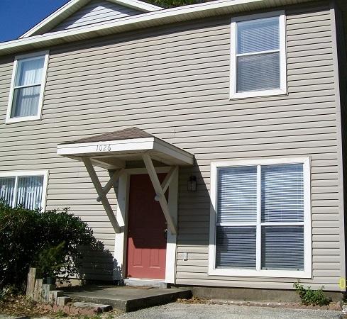 Two-story end unit, tucked away. Wooden deck off kitchen. Small pets allowed with a non-refundable pet fee. Available March 11th.