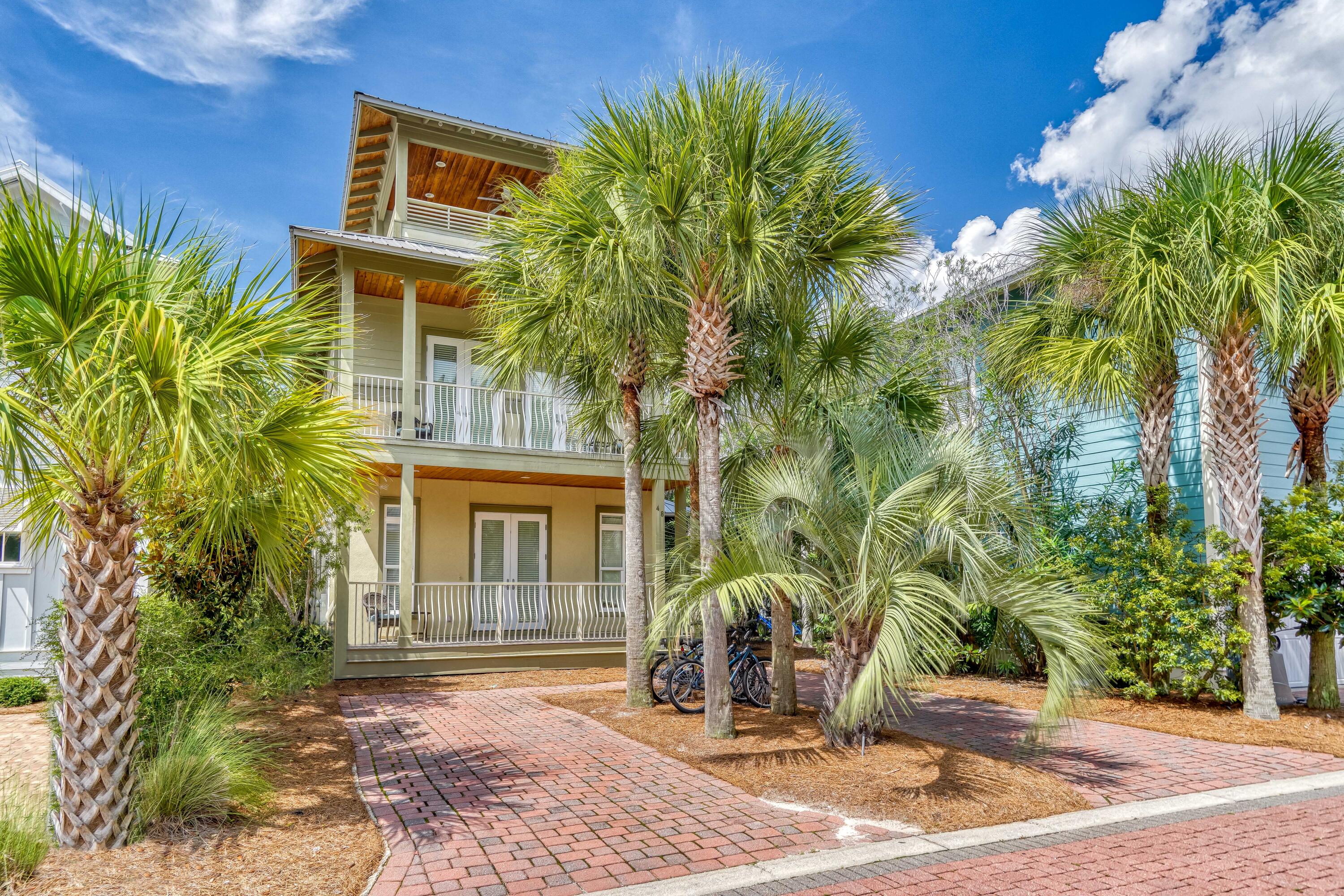 Beautifully maintained beach home located in the coveted Seacrest Beach community only steps from the 12,000 square foot lagoon-style community pool. This 3 story home features a junior master suite on the first floor with king bed, balcony access and private master bathroom with tiled walk in shower. Open and inviting floor plan featuring natural Pine hardwood flooring throughout, and a beautiful kitchen with stainless steel appliances, pendant lighting and a large island. There is a spacious dining area and comfortable living room with abundant windows offering natural light. On the second floor there is an additional master bedroom with king bed, balcony access and huge master bathroom with tub, marble countertops and (See More...) tiled walk in shower. The second floor also features two bunk rooms each with a full-size bunk over a twin bed and balcony access. The third floor functions as the fifth bedroom with full bathroom, queen sized pull out sofa and access to two spacious decks to watch the sunrise and set. Two new hot water heaters and new tile in the master shower were installed this year. Home has 6 balconies with beautiful views. The Seacrest Beach community boasts a 378,000-gallon pool and over 1.35 miles of shaded walking trails.