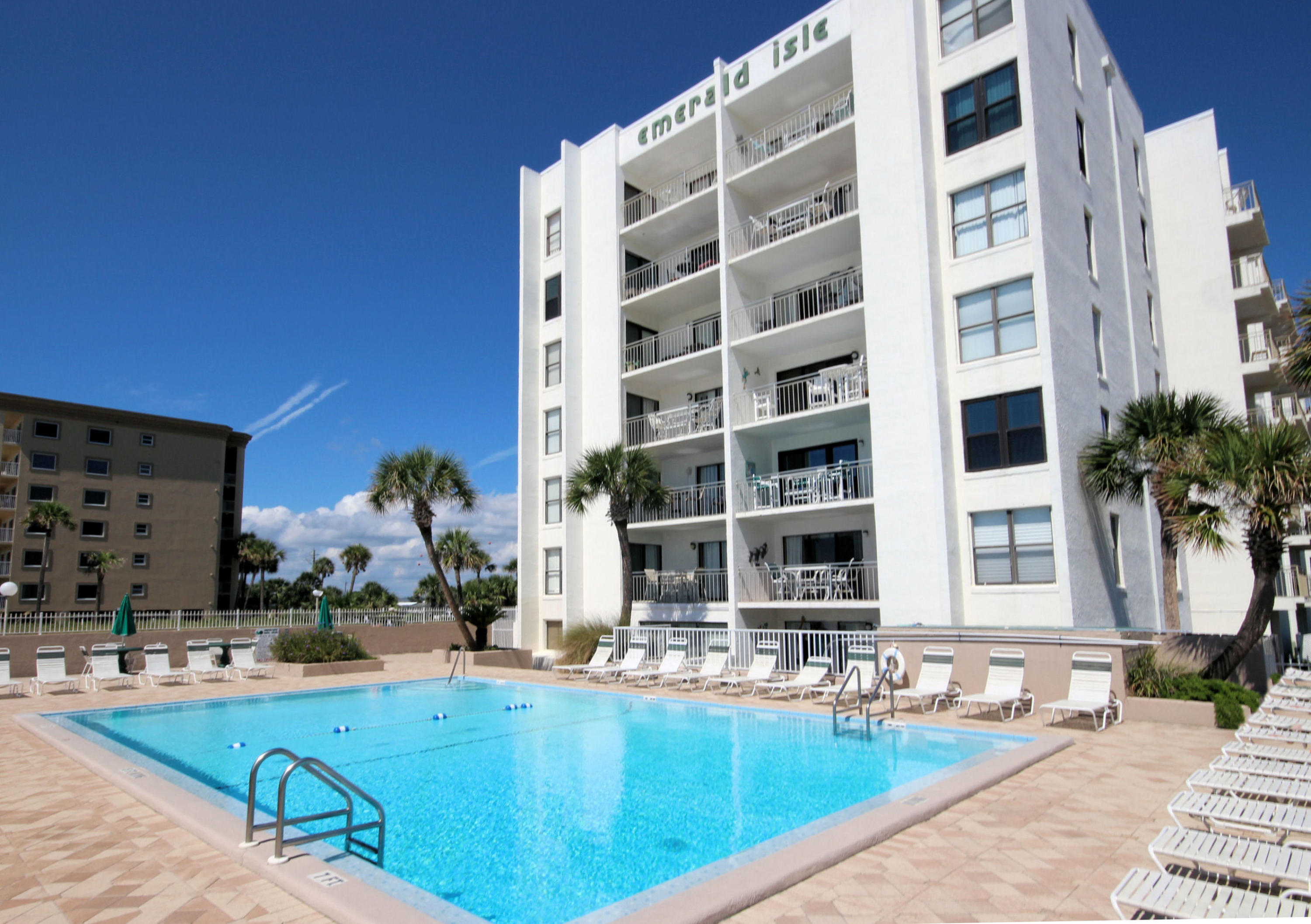 Gorgeous fully renovated condo steps from Gulf of Mexico. Brand New custom granite counter height table/bar, Maytag stainless appliances, Mosaic tile back splash, Solid box wood facing cabinets, and under-mount Kohler double sink/designer faucet. Living room (chair rail/wainscoting)and Master bedroom each have slider to porch with windows/screens. Bunk room has granite top storage and wall mounted lighting. Custom soffitt LED lighting, 18'' ceramic tile cut on diagonal, decorator color palette and 7 1/2'' baseboards. Elevated power and A/V supply in bedroom, living room, and bunk room. Double pane windows, new doors/brushed nickel hardware. Bath: Walk in shower features rain head plus dual shower heads, Kohler sink, Moen faucet, water saver toilet, granite vanity. Just Bring Flip Flops!