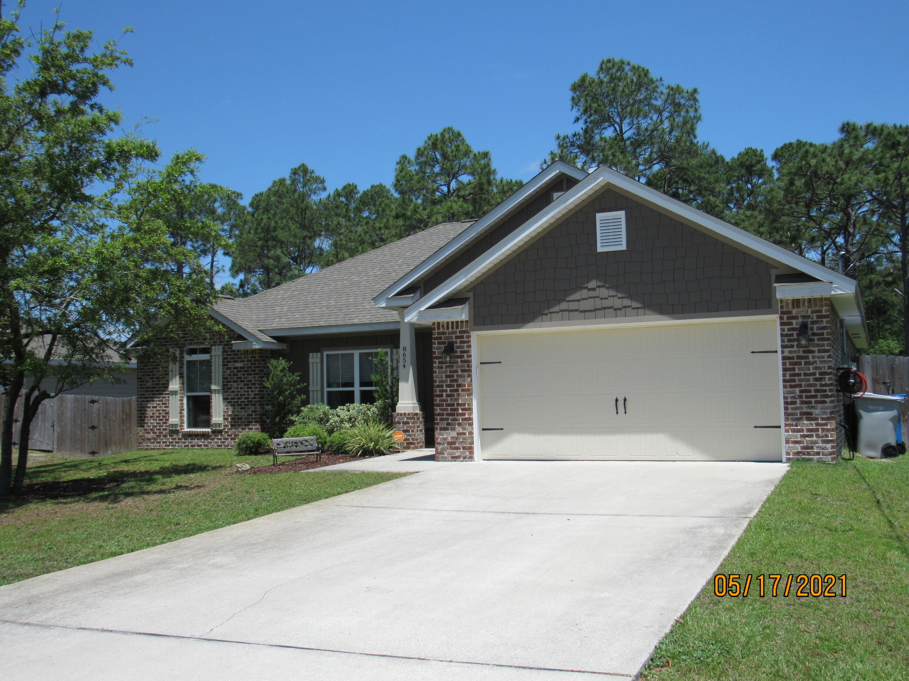 Gorgeous 4 bedroom, 2 bath brick home conveniently located on a large, privacy-fenced lot with an easy commute to beaches, bases, schools, shopping, restaurants, and more. There is a spacious living room with recessed, color-changing lighting, which leads out to a covered back porch, and the kitchen has plenty of upgrades, including 2 walk-in pantries, granite counter tops, soft-close drawers, an island, breakfast bar, stainless appliances (complete with flat cooktop stove), reverse osmosis faucet, formal dining area, and more! This lovely home features a split floor plan for privacy, and the master boasts tray ceilings with its own en suite to include a granite double vanity, walk-in, tiled shower with rain shower head, garden tub, walk-in closet, & separate toilet room. The three guest rooms are nicely sized and share their own full bath, as well. Surround sound wiring & option for tenants to utilize existing security system (at tenants' own expense). Owners providing AC filters and water filters. Pets may be considered on a case-by-case basis with prior owner approval and a non-refundable pet fee. No smoking, including vapes.