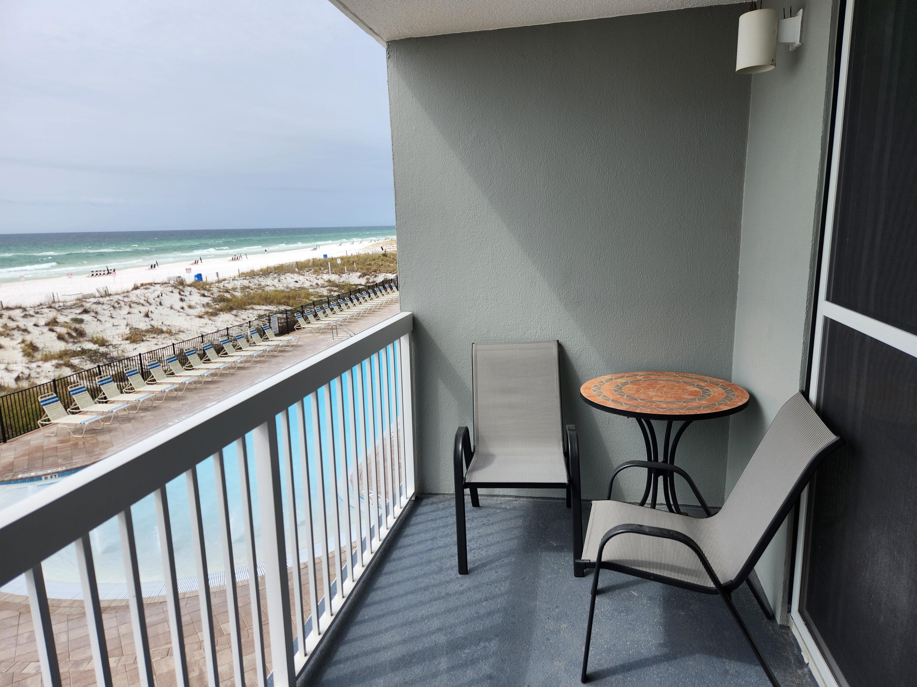 Welcome to Pelican Beach 202! TURN KEY upgraded unit awaits a new owner! New LVP flooring through main living area and bedroom. Kitchen features a beautiful granite counter top and stainless steel appliances. Built in bunks with lighting! Popcorn ceiling removed. Amenities include 3 pools, two of them heated in the winter. New 114 ft. zero entry pool right on beach w/12-seat spa, tennis court, covered parking, TIKI bar, Cafe, game room, sauna. ***A special assessment for elevator modernization project has been approved for a total amount $7,149, split in two payments. First payment of $3,574.66 is due April and second payment of $3,574.66 is due in September.***