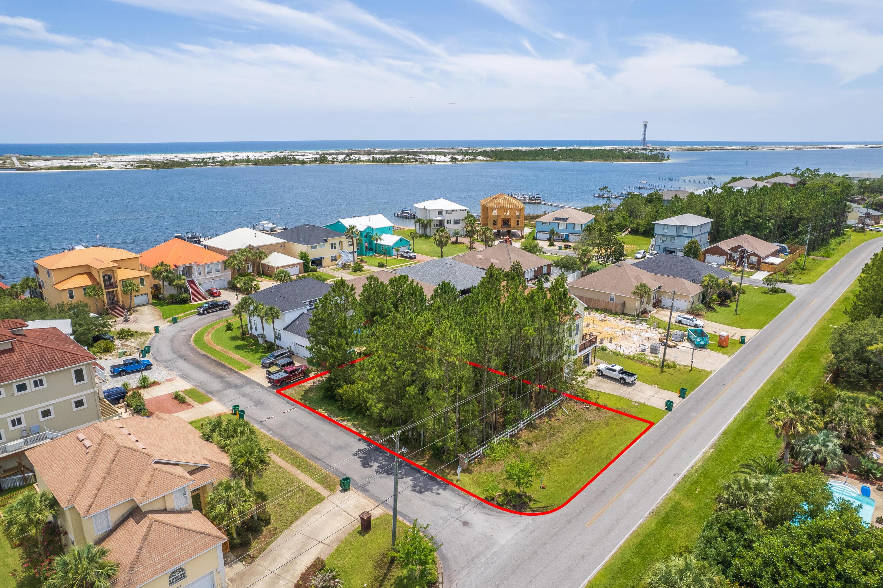This corner lot in the GORGEOUS Sparkling Waters Subdivision is awaiting for you to CUSTOM BUILD your dream home and is perfectly situated right down the street from the BEAUTIFUL Santa Rosa Sound! Your new subdivision offers a gated community beach and community dock with boat slips for your water toys. Sparkling Waters is 3 miles from Hurlburt Field and convenient to all the beaches and shopping one could ask for! Don't miss out on this fantastic lot! CALL YOUR REALTOR today!!!