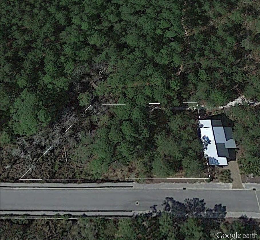 Build your dream home or beach retreat. Lot backs up to the State Forest. Within walking distance to the beach. Lakeside Community backs up to Redfish Village with shops and dining. Community has a clubhouse and pool. LOW HOA Dues! Only $190/quarterly. Survey in Documents. Listing agent has ownership interest in property.