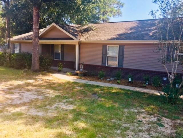 PRICE REDUCED! Want the feel of COUNTRY living but still close to town? This charming 3/2 ranch home is what you've been searching for! New AC just installed this year! The kitchen and bathrooms have granite countertops and the living room and master bedroom feature crown molding. This property is located on a corner lot with a privacy fence and paved road. Don't miss out on this adorable home!