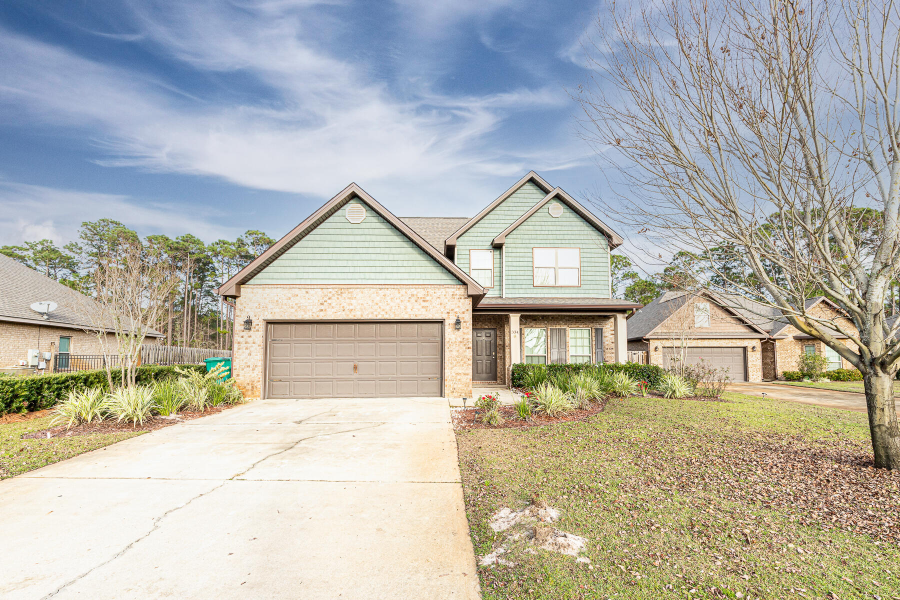 UNDER CONTRACT BUT ACCEPTING BACK UP OFFERS!

Welcome to the highly desirable neighborhood of Driftwood Estates. This beautifully maintained 'Grace' Floor plan home features 4 bedrooms, 2.5 bathrooms, and a 2 car garage. This home is situated on a EXTRA LARGE LOT backing up to the plush forest and situated along the 'Driftwood Trail'. This home has 1 Master Bedroom on the main floor with another large bedroom upstairs that can be used as a second Master or game room. This home has beautiful engineered hardwood flooring throughout the common living spaces on the main floor and upstairs landing. The spacious Master Bedroom also includes an ensuite bathroom that has a two separate vanity sinks and an stand up tile shower with a bench.  The large master closet can also be found right off the en-suite bathroom.
On the second floor you will find the three additional spacious bedrooms and laundry room. 
This home features white cabinetry, granite counter tops through out, stainless steel appliances, a beautiful white washed accent wall in the living room, recessed lighting, ceiling fans in all the bedrooms, irrigation on a well to keep the yard green and plush, and a large screened in back patio that is perfect for entertaining. The back yard is fenced in and has plenty of space to create your own outdoor oasis. 

Driftwood Estates Community is a highly sought after neighborhood just minutes from the Beaches of South Walton and 30A. The community includes a well maintained pool, ponds, sidewalks, parks, playgrounds and well landscaped common areas. This neighborhood is minutes from Sacred Heart Hospital, upscale shopping, popular local dining, entertainment, area golf courses and Grand Boulevard. Do not miss your opportunity to own this beautiful home in a great neighborhood!