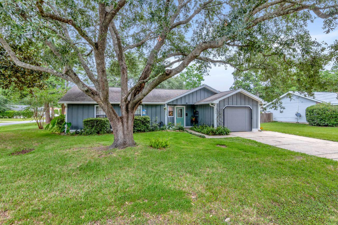 Cute as a button! This adorable 3 bedroom 2 bath home sits on a large corner lot flanked with large beautiful trees. The primary bathroom ensuite has just undergone a makeover with a gorgeous tiled shower. The primary bedroom has a raised ceiling, tile floors and a walk in closet. In the bright and airy kitchen you will find newer white cabinets, granite counters and stainless appliances. The current owners had a gas line ran to the home and installed a 5 burner gas stove in 2019. One of the few home in the neighborhood with natural gas. They also installed a new gas water heater at that time. No more worrying about having hot water when the power goes out! The sleek and stylish refrigerator and the dishwasher were just purchased this year. Click for More... The owner is also having a new roof installed prior to closing for peace of mind. The kitchen opens up to a spacious dining room that can accommodate a large table to entertain plenty of friends and family. The living room features tile flooring (no carpet in this home!) as well as a vaulted ceiling, floor to ceiling stone wood burning fireplace for those chilly winter nights. The sliding glass doors will take you outside to the huge fenced-in backyard that features raised garden beds and a tree swing. There is also a concrete patio perfect for grilling up dinner. The location directly between Eglin AFB and Hurlburt Field makes Mixon Dr a very desirable place to live. No fighting traffic to Crestview or Navarre! This home is also located in close proximity to the Northwest Florida State College Ft. Walton campus as well many shopping and dining venues.