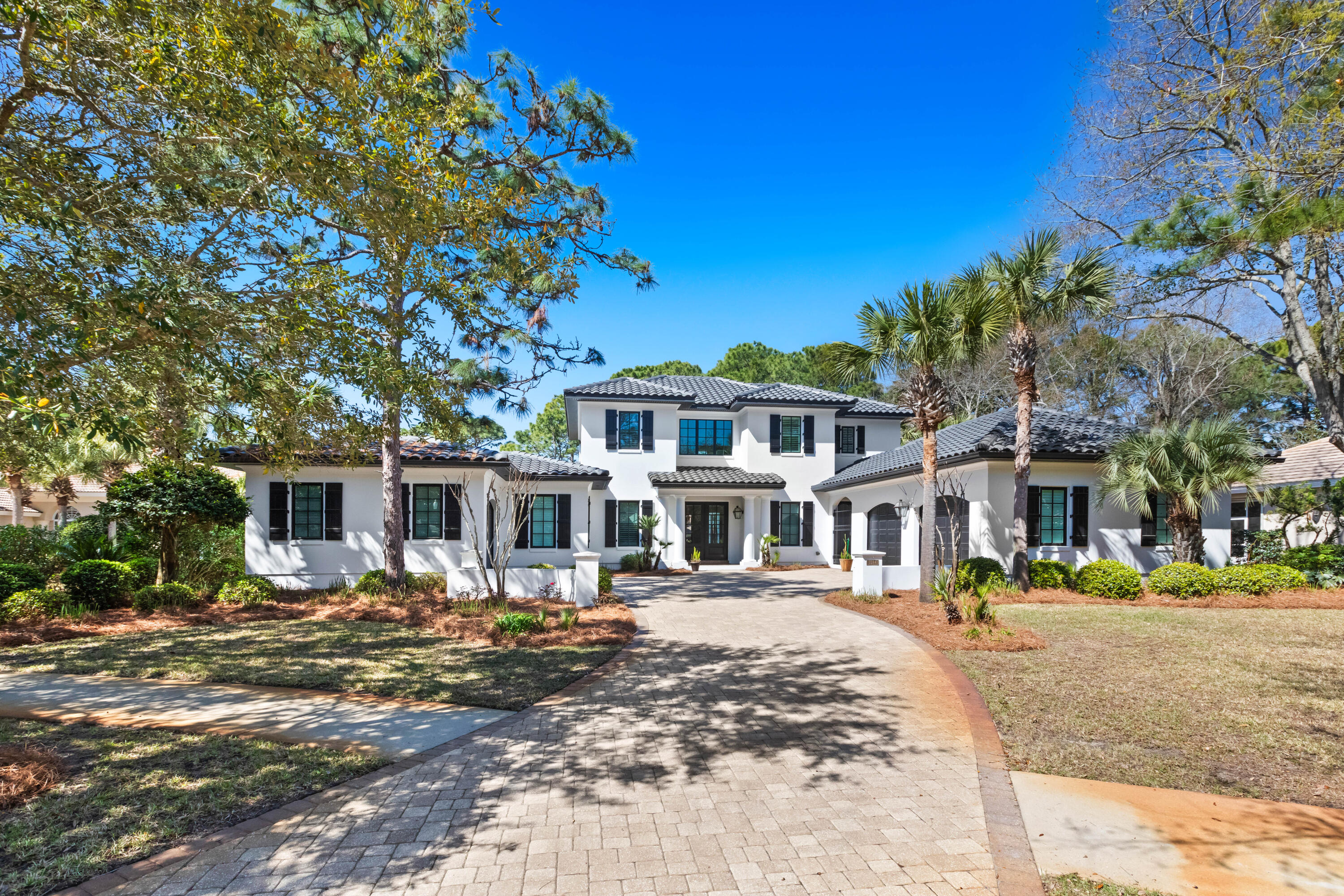 Luxury Living on Burnt Pine Golf Course!

Nestled behind the gates of Burnt Pine, this like-new 4-bedroom, 4.5-bath, 3,426 sq. ft. Huff Homes masterpiece is perfectly positioned on an exceptional lot, offering breathtaking views of the golf course, lake, and bay. Designed for both comfort and elegance, this home seamlessly blends refined design, high-end upgrades, and incredible outdoor living spaces.

Overlooking Burnt Pine's 13th hole, the expansive lot provides a picturesque setting with lake and bay views in the distance. The thoughtfully designed open floor plan creates a seamless indoor-outdoor flow, perfect for both relaxing and entertaining. The home features two private main-floor suites, each with its own en-suite bath, offering comfort and privacy. Upstairs, two additional spacious bedrooms also include en-suite baths, along with a second living area and a balcony that captures stunning bay views.

The outdoor space is truly an oasis, featuring a private pool and spa, a screened porch, and a summer kitchenideal for enjoying Florida's beautiful weather year-round. A three-car garage provides ample space for vehicles, golf carts, and storage.

This home has undergone extensive upgrades, including a complete HVAC overhaul with new ductwork, registers, an updated HVAC unit, and retun air replacements. The kitchen has been fully renovated with new cabinets, a custom range hood, a Café gas range/oven, a Café refrigerator, a new sink, quartz countertops, stylish new cabinet hardware, and a new disposal. The master bath now features a luxurious bidet toilet, adding a touch of modern sophistication.

Freshly painted both inside and out, the home also boasts refinished doors and a newly painted roof. Both garages have been upgraded with new epoxy flooring for a polished finish. Lighting enhancements include new fixtures in the dining room, kitchen, and powder room, along with new ceiling fans throughout the home. The pool and spa have been upgraded with a new pump, heater, and water valve, ensuring optimal comfort and efficiency.

This impeccably updated Burnt Pine gem offers the perfect combination of luxury, privacy, and stunning views. A rare opportunity to own a premier home in one of the most sought-after communities. 

Famous for its championship golf courses, Burnt Pine at Sandestin offers much more than just exceptional fairways. Indulge in tennis, watersports, and a 223-slip marina, or explore award-winning dining and endless shopping at Grand Boulevard and the Village of Baytowne Wharf. Plus, a convenient shuttle ensures effortless access to the stunning white sandy beach, cooler in tow.