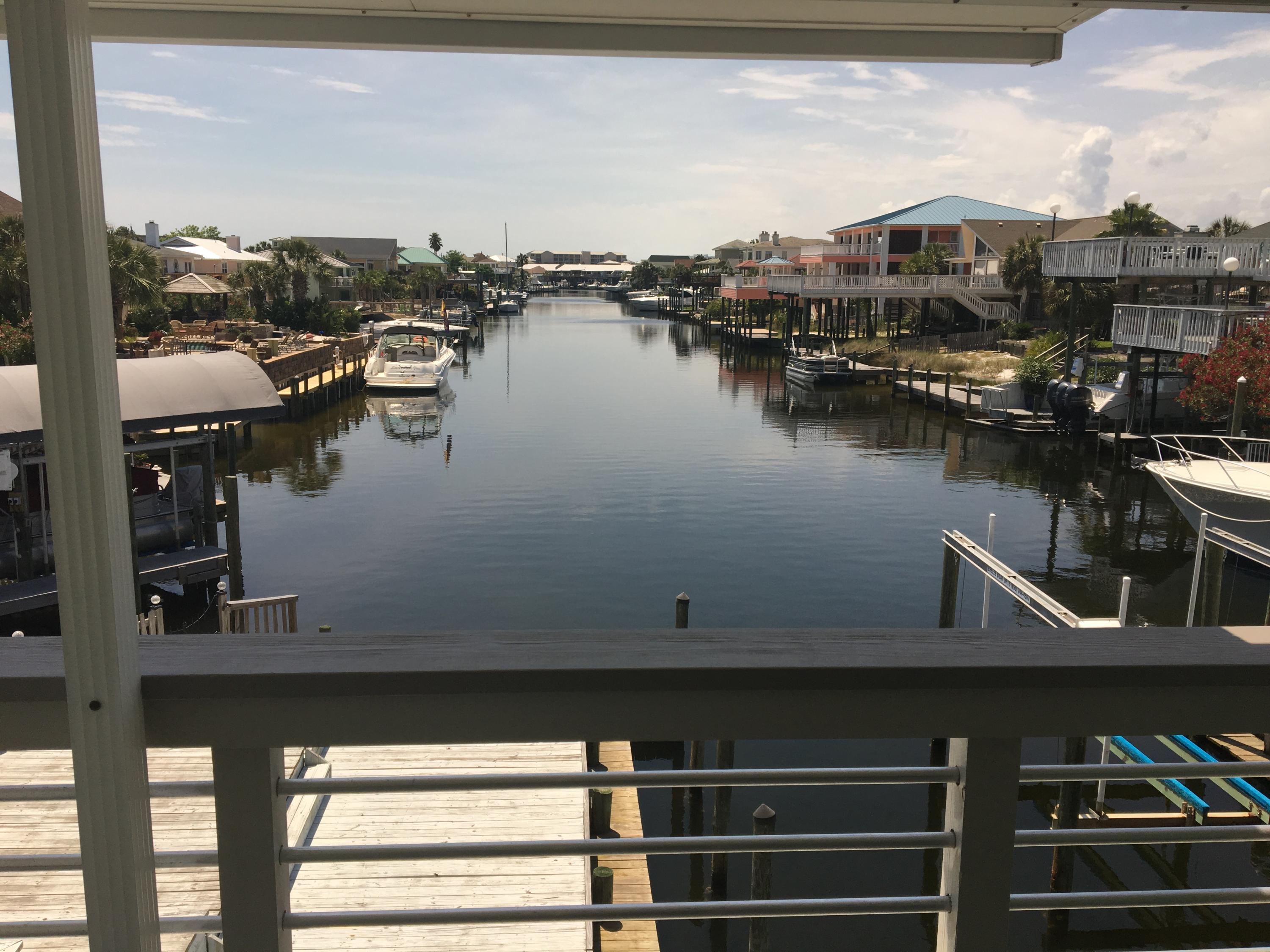 A boater's paradise and the best canal view on Holiday Isle!! Deep protected water suitable for large boat, small boat and water toys! Just minutes to the Destin Harbor and East Pass! Just one block to the beach and Gulf access! This beach house makes a perfect rental property, second home or permanent residence and has separate guest quarters downstairs. Enjoy the open pool deck and waterfront pool as well as beautiful sunsets and fireworks displays! Please verify all dimensions.