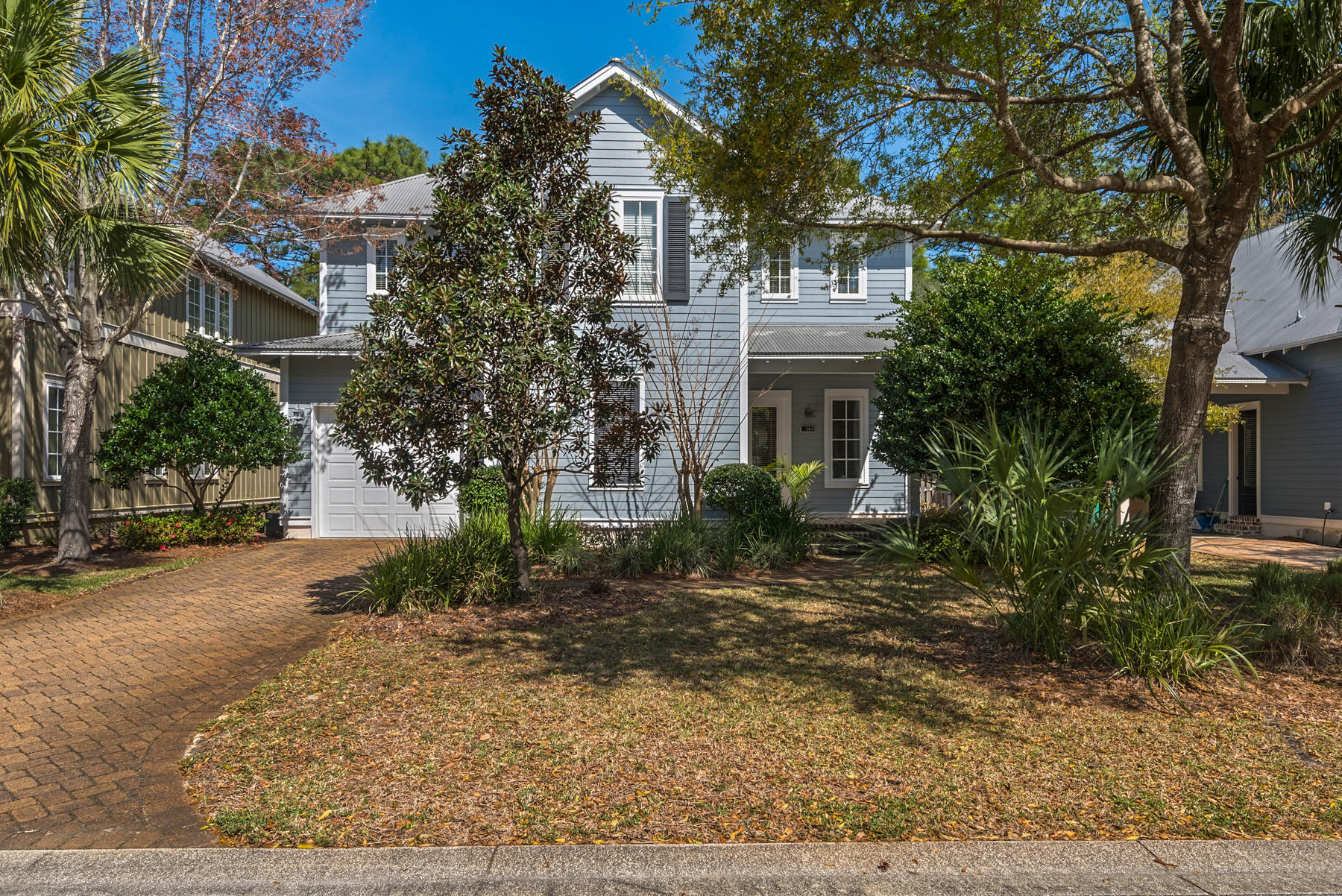 Attention Water and Boat Lovers! Carson Oaks is a residential rental restricted community with bay access from Carson Oak's private gated Marina featuring a boat ramp, boat slips, fish cleaning station, kayak/stand-up paddle storage and boat parking on a first come first served basis. Carson Oaks entry is lined with beautiful old oaks and the neighborhood features a beautiful pool and common areas along with a quiet street perfect for families. Upon entering 164 Carson Oaks, you are greeted with an inviting and open living space. You will notice hard surface flooring throughout and quality craftsmanship of this home built by Huff Homes. The kitchen features a pantry, breakfast bar, stainless appliances and granite countertops and is bright and open for easy entertaining of family and friends. The kitchen marries the spacious dining and living room with a series of windows letting the outdoor light in. The first level also features a powder room for guests. Enjoy the outdoors on the large screened porch which is accessible from both living room and the master bedroom. The Master Bedroom Suite is perfectly situated on the main level offering privacy and a walk-in closet, separate water closet, dual lavatories and walk in shower. The two guest bedrooms are located on the second level and feature their own private baths. An added feature is a living space adjoining to the two guest en-suites and is ideal for a home office or sitting area for guests or children to play games. This home also features a one car garage perfect for storing your car, bikes or beach gear. Low maintenance yard as all landscaping is included in the HOA fees. Carson Oaks is a unique community conveniently located near shopping, dining and entertaining of Sandestin, Grand Boulevard, 30A and Destin. We invite you to explore 164 Carson Oaks and discover the beauty of life at Carson Oaks.