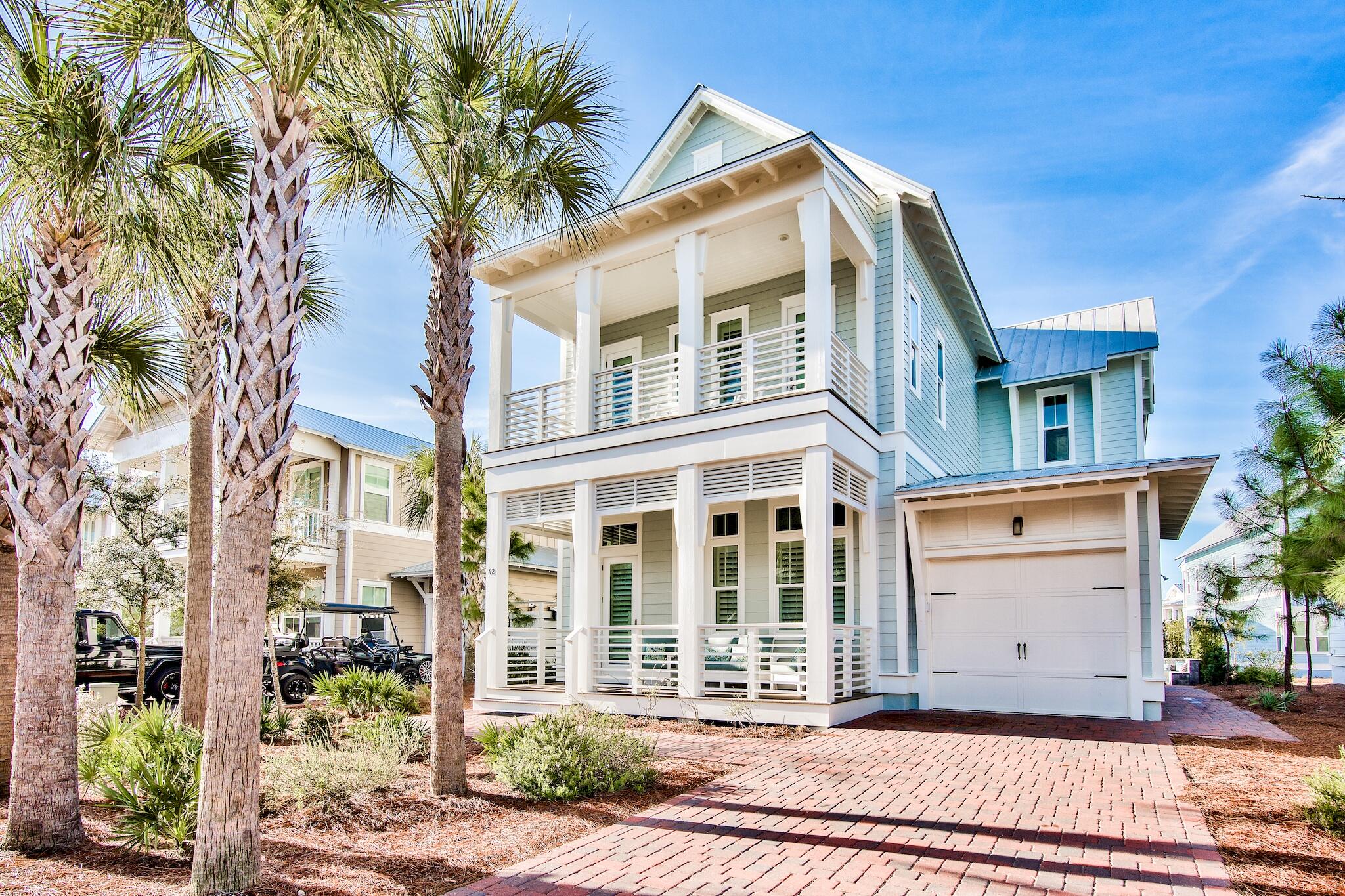 This stunning beach home south of 30A offers a rare combination of luxury, location and space! Live in style and luxury in this highly appointed ''one of a kind Laguna floor Plan'' in the highly desirable community of Prominence South. This expansive four-bedroom, four and half-bathroom has been professionally designed and is sold fully furnished! A sophisticated coastal style that defines indoor and outdoor spaces that seamlessly blend into one harmony. The homesite sits on a private lot tucked into the preserve which exudes the ultimate privacy. The home features exceptional woodwork & custom moulding throughout leaving absolutely no details untouched. The kitchen is a chef's dream with stainless steel appliances, expansive cabinetry, Granite counter-tops, hardwood floors, and a massive island that opens up into the living/dining area. This unique floor plan proudly displays two spacious master suites and two more guest bedrooms with ensuite baths. There is also a spacious media room upstairs that exudes comfort and privacy. Other features throughout include 12ft-14ft ceilings, 8ft doors, professional designed lighting, plantation shutters, and a washer/dryer. Property will sleep 14-16 people comfortably and not to mention plenty of parking which is rare along 30A! HOA: $150 per month includes landscaping, beach shuttle, security, resort style pools, and gym. Unwind your day by relaxing on the swing under your covered porch or walk over to the Hub where you'll find a variety of entertainment from shops, restaurants and more. Rental Projections $80,000 - $90,000 per year. 

The Town of Prominence is located on HWY 30A between Seagrove and Alys Beach. Residents will enjoy easy access to a beautiful Town Center, Resort style pools, Fitness Center and Private Shuttle Service to the beaches of 30A. ''The Hub'', the community's town center includes restaurants, shops, and an amphitheater with covered event pavilion, a cinema screen for movies as well as a stage for concerts and events.