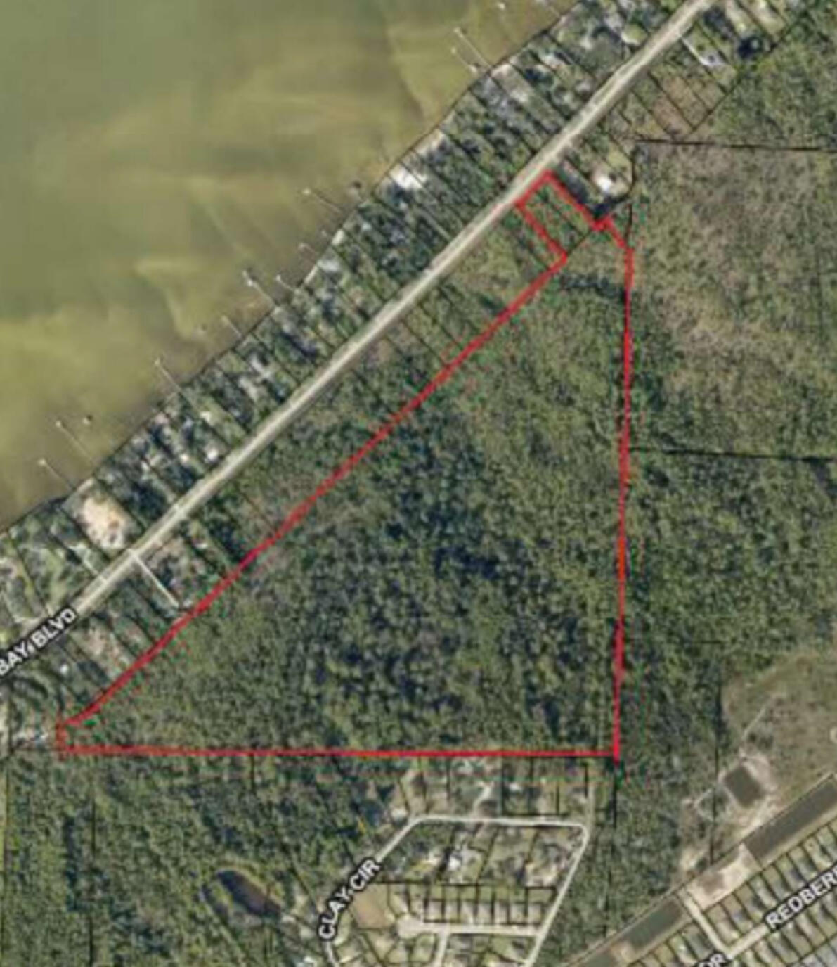 Rare 75.62+/- acre Opportunity in Gulf Breeze!
Combining three parcels into one extraordinary offering just off Hwy 98. Rolling, partially wooded terrain with convenient road frontage—make it your private estate ground, mini‑development site, or preserved sanctuary. Electric runs nearby; buyer to verify utilities. A rare opportunity for land this large in one of Santa Rosa County's most desirable coastal communities.