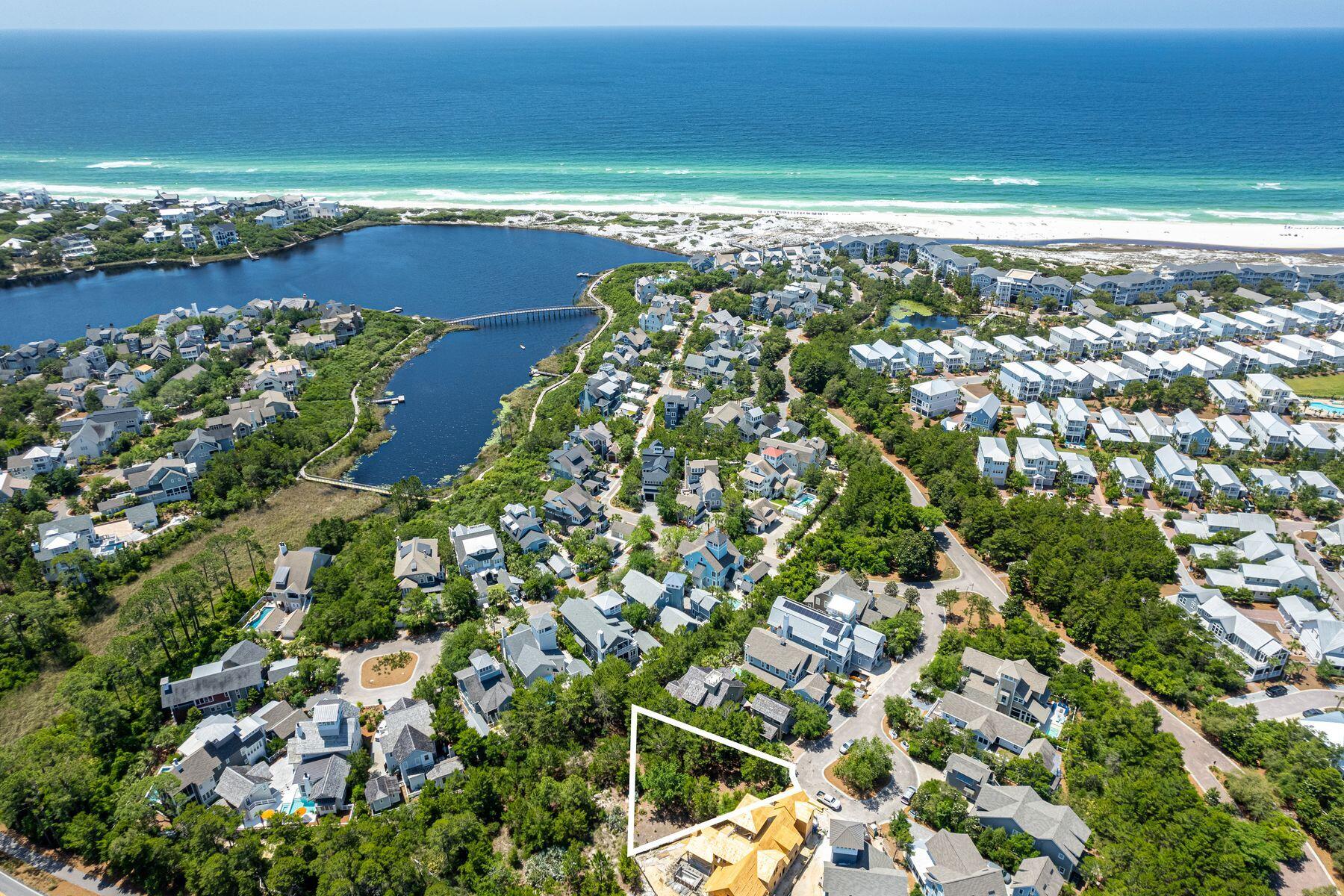 WaterSound Beach resides on 1,400 acres and offers almost a mile of linear private white sugar sand beaches. One of just a few homesites left in this gated community.  This property is situated at the end of a quiet street in the Bridges district. It presents a perfect opportunity to build your dream home in one of the most beautiful and private neighborhoods. Enjoy 2 beautiful community pools, a dock access to Camp Creek Lake, Puttering Park, a state-of-the-art fitness center or one of the 6 boardwalks over the iconic sand dunes of WaterSound leading to the Gulf of Mexico. The culmination of amenities and exclusiveness affords residents with the epitome of private coastal living while remaining geographically poised near the world-class dining and entertainment venues 30A has to offer.