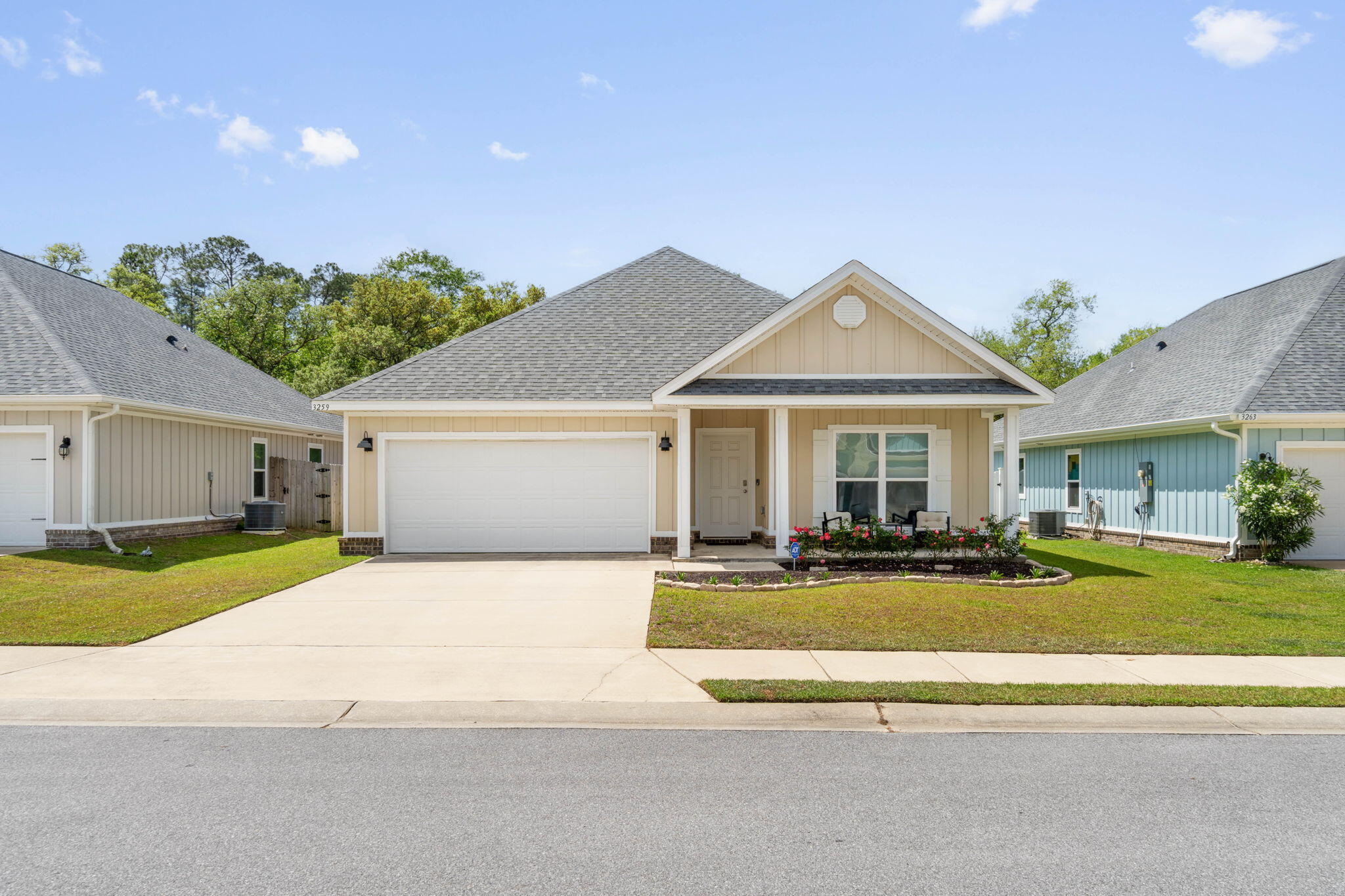 Welcome home to this inviting craftsman style 4 bedroom home just built in 2020! Nestled among the beautiful oaks trees, Heritage Oaks is an adorable community with sidewalks, underground utilities, and no thru traffic adorned with coastal colored homes just minutes to beautiful Navarre Beach! Pull into the driveway and appreciate the covered front patio, and inside you'll find a great split floor plan layout with luxury vinyl plank, upgraded features like trey ceilings, and granite counters throughout. There are two bedrooms at the front of the house with a full bathroom between them, continue on down the expansive hallway you'll find the third bedroom and an interior laundry room across from the two car garage. The kitchen is well appointed with granite counters, a walk in pantry, and stainless steel appliances including a french door refrigerator with smart screen! The kitchen is open to the dining room space which leads to the living room featuring double trey ceilings! The owner's suite is a perfect space to enjoy complete with another trey ceiling and an en suite that features a double vanity with granite counters, a soaking tub, and separate walk in shower along with a private water closet. Outside you'll enjoy relaxing on your covered back patio! Don't delay on this move in ready home!