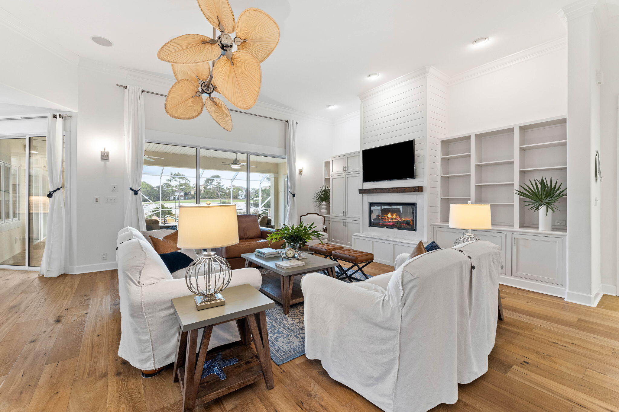 Discover your dream beach retreat where coastal charm seamlessly blends with golf course living. This beautiful home is nestled along the fourth fairway of Santa Rosa Beach Golf Club, just steps from the sugar-white sands of 30A. Designed for both relaxation and entertaining, this well-designed residence offers a private heated pool and jacuzzi, a summer kitchen, a putting green, and a built-in sound system that spans the entire property. Step inside to a spacious entry foyer that flows into the open-concept living area, highlighted by triple glass doors that open to the screened-in patio, perfect for embracing indoor-outdoor living. The remodeled kitchen is a chef's delight, featuring updated cabinetry, a wet bar, Bosch appliances, and a water filtration system. This thoughtfully designed single-story home boasts four bedrooms, including a luxurious primary suite with a newly renovated bathroom (completed November 2024) and a walk-in California-style closet, two guest bedrooms connected by a stylish Jack-and-Jill bathroom, and a versatile guest suite or studio with a private entrance off the patio for ultimate flexibility.  Additional features include a dedicated home office with built-in shelving, a spacious laundry room, and a reinforced two-car garage along with hurricane-resistant windows, front yard lighting and hardscaping, and an irrigation system. This meticulously maintained property offers more than just a homeit provides a lifestyle. Located in a sought-after neighborhood with no HOA, don't miss this exceptional opportunity. Schedule your private tour today!