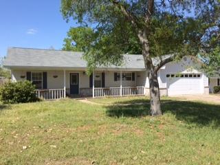 South of I-10! Call today to see this nice 3BR/2BA home fenced, level lot, 2 car garage, open floor plan with fireplace in living room, kitchen with all appliances, dining room, split bedroom plan, back deck and more. Call today!