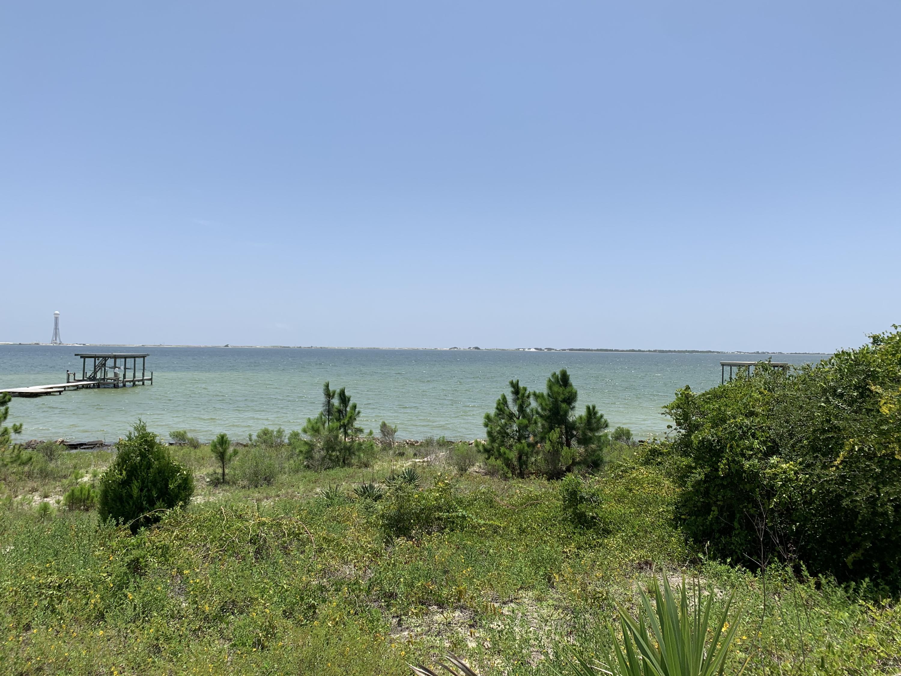 BACK ON THE MARKET!! BUYER COULD NOT CLOSE!! AWESOME VALUE FOR A WATERFRONT LOT!! Incredible lot with 188 feet on Santa Rosa Sound and the Gulf Intracoastal Waterway! Spectacular views and sunsets on this protected body of water directly across from Santa Rosa Island and the Gulf of Mexico.

Simply an outstanding location to build your home and boat dock. According to Okaloosa Growth Management, building footprint limited to approximately 165 X 31.6 X 165 X 42.8 which equates to 5,700+ square feet per story. Home height  limit is 45 feet which should easily allow for three floors.