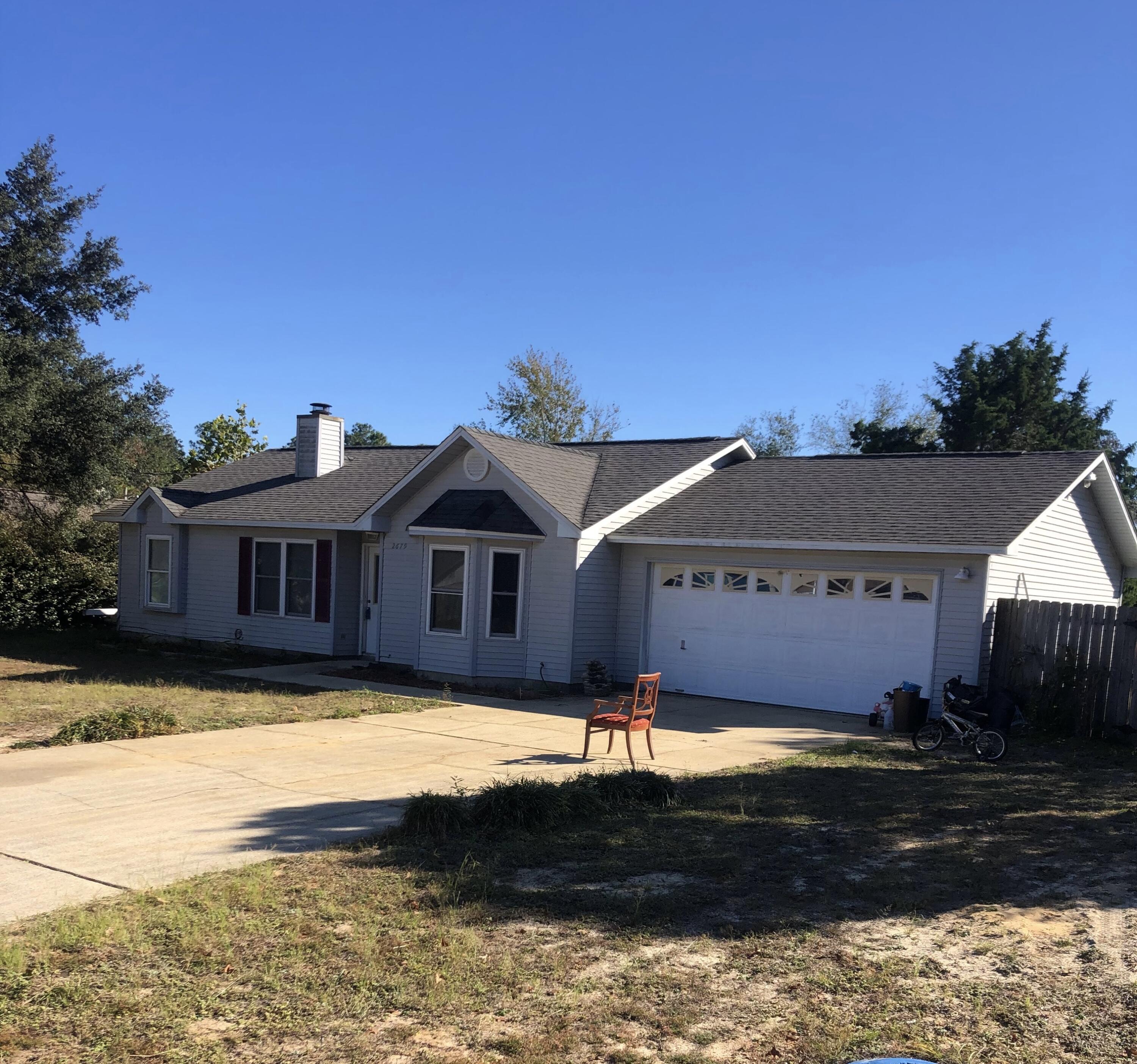 Fantastic oversized corner lot in great neighborhood.  Split floor plan.  Master bedroom has bay window and walk in closets.  Living room boasts woodturning fireplace.  Needs some TLC but will be a wonderful home for your family!  AS IS!