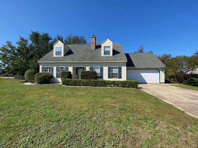 Charming Colonial Style Home! Move in Ready 3BR/2.5BA home is located close to Beaches, Bases and Shopping!  There is a Large Eat-In kitchen with Wood Cabinets, Granite Countertops, a Breakfast Bar and a Garden Window that overlooks the back yard. The large Living Room has a wood-burning fireplace with raised hearth. The Spacious Master Bedroom is on the 1st Floor and has a large closet.  Laundry is near the kitchen and Washer and Dryer are included in the sale. There is a half bath downstairs for guests.  Upstairs, there are two additional bedrooms with charming dormers and a Full Bath with a new Tub/Shower combo.  This home has Low Maintenance Vinyl siding and a hurricane rated garage door. The privacy fenced back yard has a wooden deck, fruit producing pear tree and plenty of room for pets and play!  Some other recent  improvements are:  3-Ton HVAC in 2020  - New Garage side entry door - New Chimney Cap & New Sprinkler timer.  Roof is 2005 and insurance is available.  The Garage has a mini-split HVAC unit to make working in the garage much more pleasant. The garage is NOT included in the square footage.  This is a Wonderful, Move-In Ready Home!  Interior photos will be added on Monday 10/25.