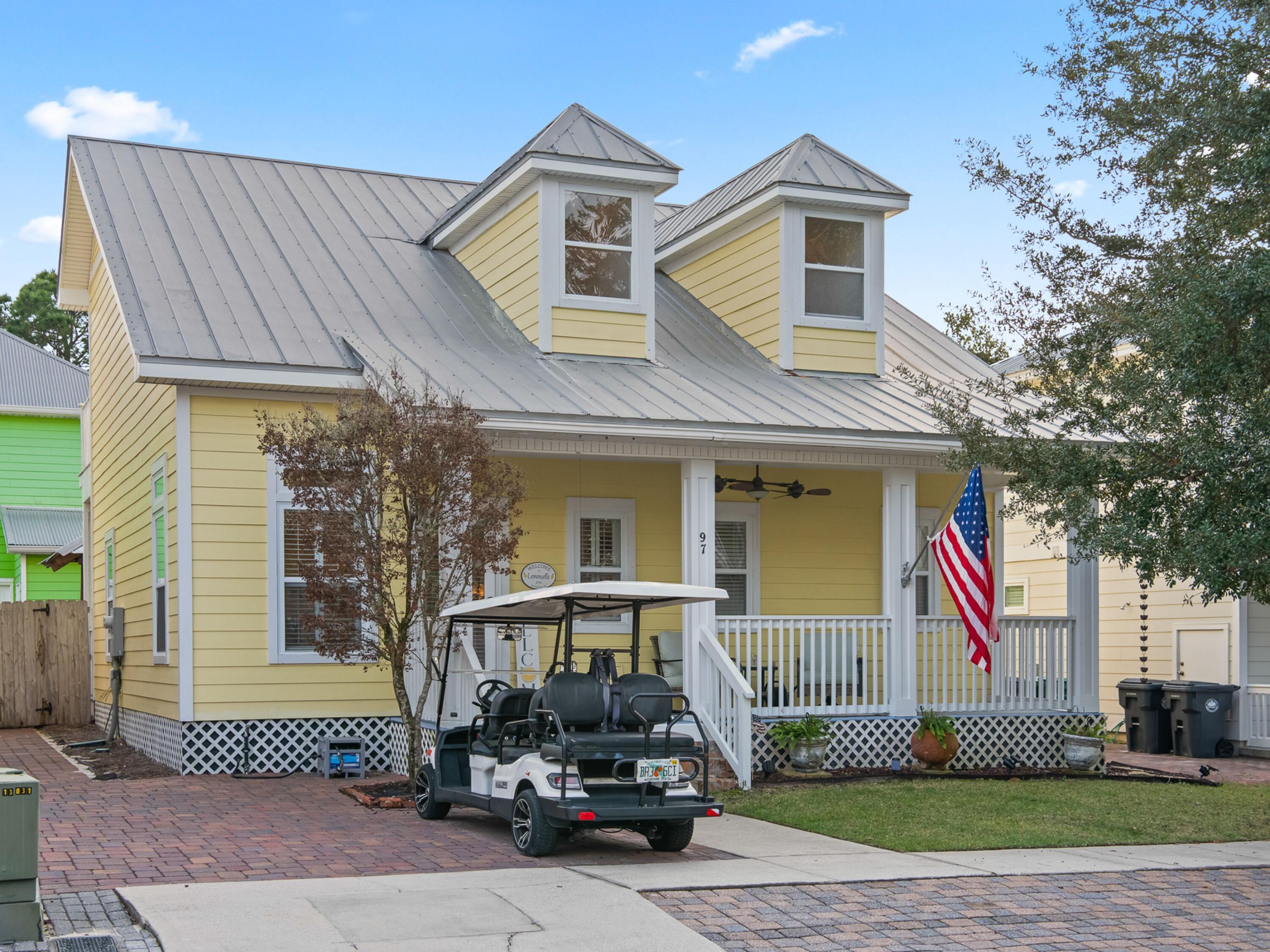 Welcome to 'Lemoncello' -- a charming coastal retreat perfectly positioned south of 30A on a quiet, dead-end street in highly sought-after Blue Mountain Beach. This proven vacation rental is on track for continued strong performance, now enhanced by newly earned Airbnb Superhost status and a long history of glowing guest reviews. Offered fully furnished and turnkey--including the golf cart--it's a seamless opportunity for buyers ready to step into immediate income.
Inside, you're welcomed by a light-filled, coastal-inspired interior designed for both comfort and durability. The main-floor primary suite offers convenience and privacy, featuring updated luxury vinyl plank flooring and a relaxed, beachy ambiance. Upstairs offers 3 additional bedrooms and a shared bath with 2 bedrooms opening up to balconies for additional outdoor spaces.  Outdoor living truly sets this property apart. Sip your morning coffee on the inviting front porch, host gatherings in the spacious fenced backyard, or unwind under the gazebo while enjoying the Gulf breeze. There's plenty of room for families, pets, and guests to spread out and enjoy the laid-back lifestyle that defines 30A living.
Located in a highly desirable area of 30A, this home also offers access to the amenities at the Villages of Blue Mountain Beach, such as a community pool, cabana, fitness center, and shuffleboard courts covered by the HOA.  Lemoncello is more than a home it's a coastal escape where memories are made.