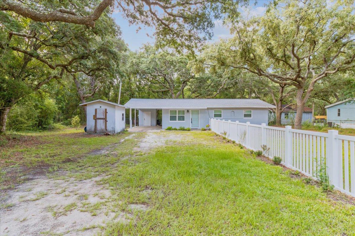 This home is located on a canal feeding into Mallet Bayou and out to the Bay. 
This adorable country 3 bedroom, 2 bath home offers the tranquility you've been searching for! 
As you enter the home, you'll be greeted by an abundance of natural light and a cozy living space. 
The kitchen has been beautifully updated with new cabinetry, stainless steel appliances, and butcher block countertops. 
The master bedroom offers plenty of space, a large closet, and en-suite bathroom.
The oversized carport includes a separate storage area. The back yard offers large oak trees, a tranquil view of the water, and a small boat slip.
Electrical re-wire, new roof, new windows, and new HVAC installed within the last 3 years.
Easy access to the beaches on 30A, Destin, restaurants, and shopping.