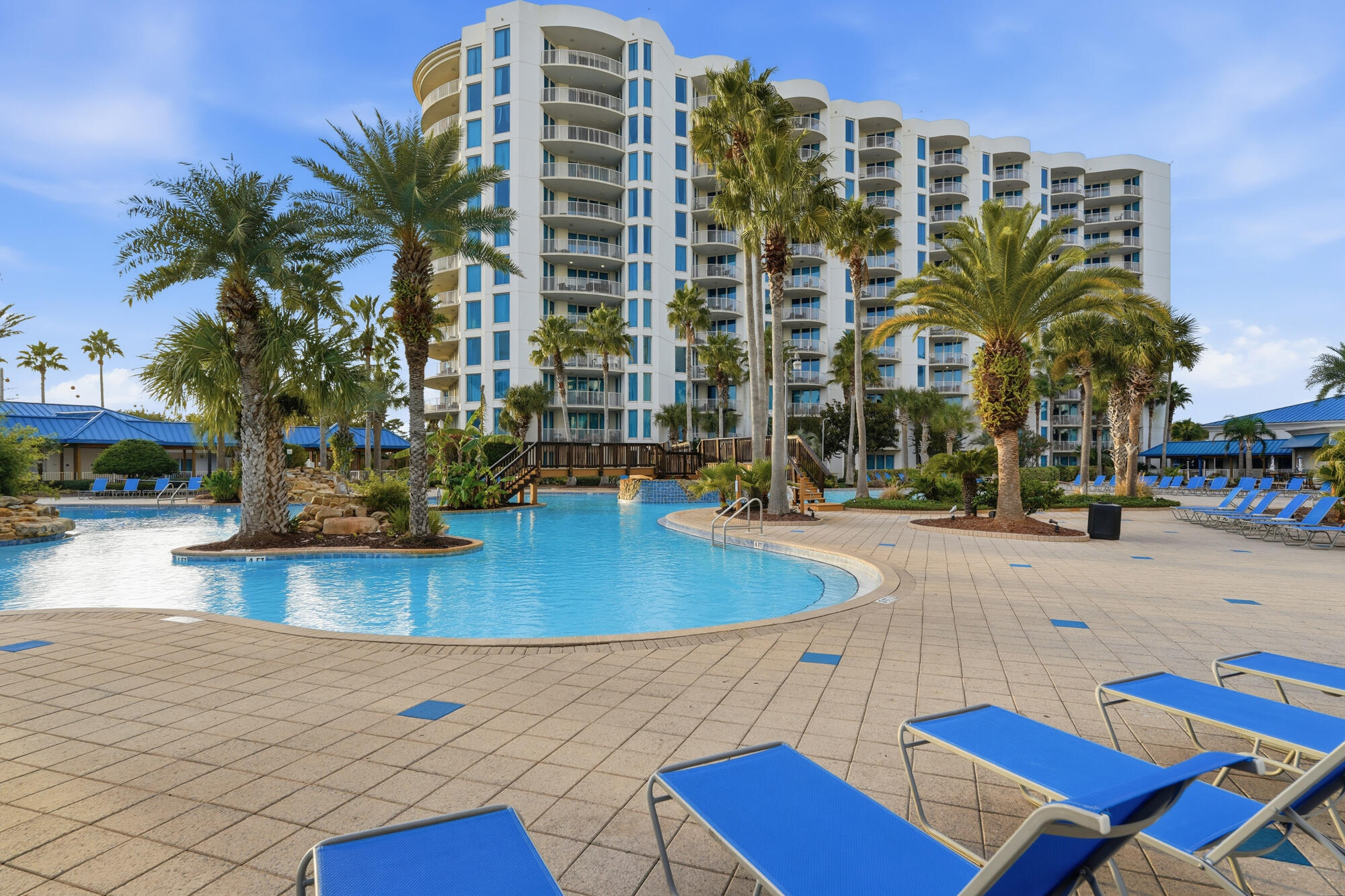 Experience effortless coastal living at The Palms of Destin in this beautifully updated two-bedroom, two-bathroom condo offering a bright, inviting interior and exceptional resort amenities. This 1,175-square-foot residence features newly renovated bathrooms, upgraded flooring, refreshed kitchen countertops, and a spacious layout designed for comfortable living. The primary bedroom includes a dedicated ensuite, while the guest bedroom also enjoys Gulf views and easy access to the second full bath. The large private balcony overlooks the protected shoreline of Henderson Beach State Park, providing a tranquil backdrop for morning coffee or evening relaxation. With multiple additional county access points nearby, and The Palms provides a complimentary seasonal beach shuttle for quick, easy trips to the sand. Easy access to Henderson Beach State Park offers a great option for enjoying a full day under the sun with convenient amenities like parking and restrooms. Ideally situated near the Destin Harbor, you'll be just minutes from iconic restaurants, boating, entertainment, and adventure. Additional conveniences include an in-unit stackable washer and dryer. The Palms of Destin offers a true resort lifestyle with a lagoon-style pool, heated pool, hot tub, splash pad, fitness center, tennis, pickleball, basketball courts, playground, community grills, and on-site dining at Good Vibes Bar and the Palms Coffee House. Whether you're seeking a beach retreat, a full-time residence, or an investment property, Unit 1702 pairs comfort, convenience, and impressive amenities in the heart of Destin.