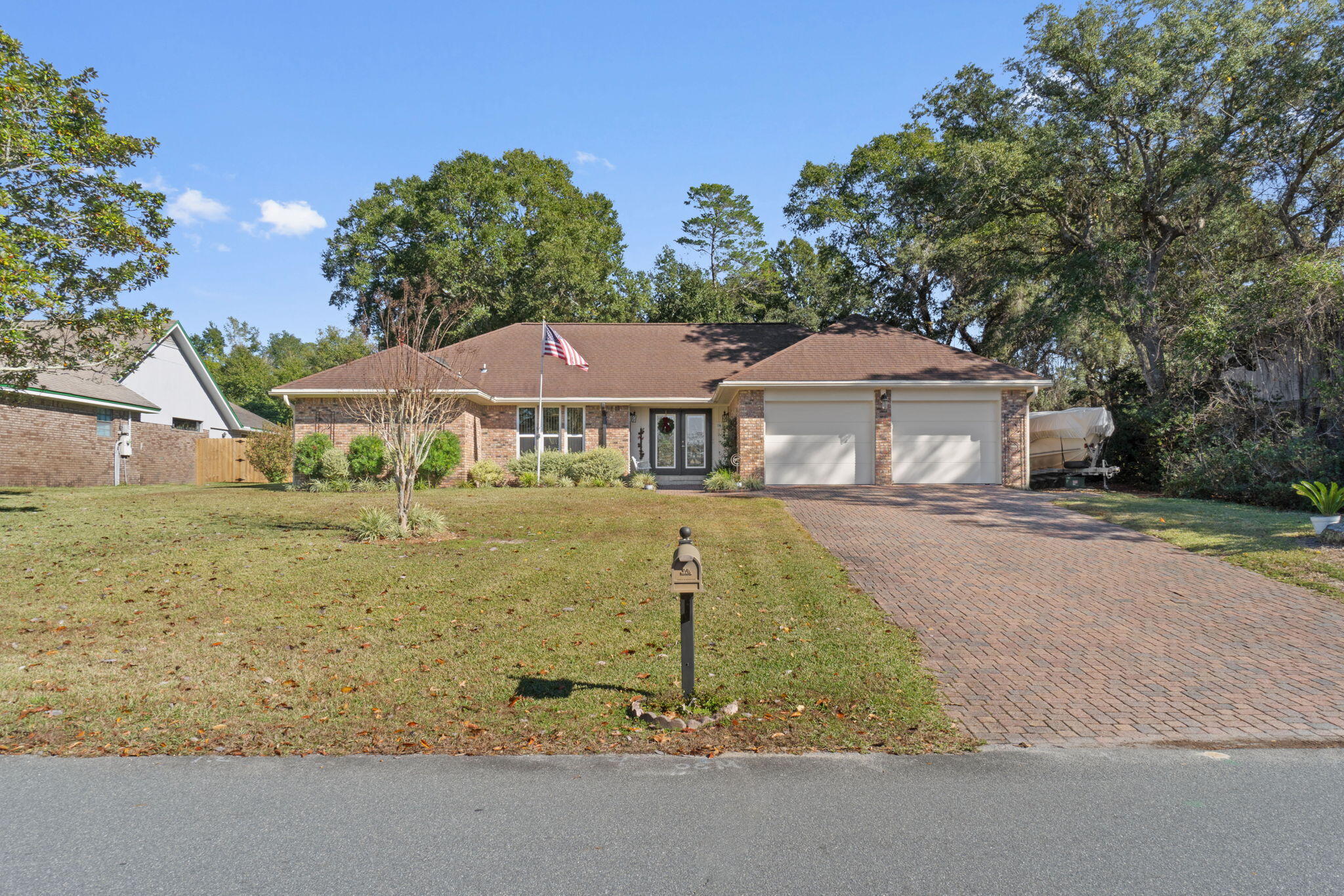 Awesome 3-bedroom 2 bath house in the heart of Bluewater Bay with a new roof being installed!  Renovated kitchen with solid surface countertops, creamy white cabinets with pull-out drawers and a pull-out pantry, glass tile backsplash, under cabinet lighting and warm wooden ceiling beams.  Tile floors flow throughout the home for easy maintenance.  The master suite includes a sitting area and an updated bath with a state-of-the-art body shower system.  Fabulous family room with vaulted ceiling and fireplace.  The fenced in backyard also has a yard building complete with electricity.  Other features of this home include: new HVAC system (2023), boat/RV parking,termite bond, solid wood doors, spray foam insulation in the attic, and pravered driveway & patio. Buyer to verify all information. Please note that the new roof and skylights will be installed in 2024 just before closing.  There is also storage over the garage.